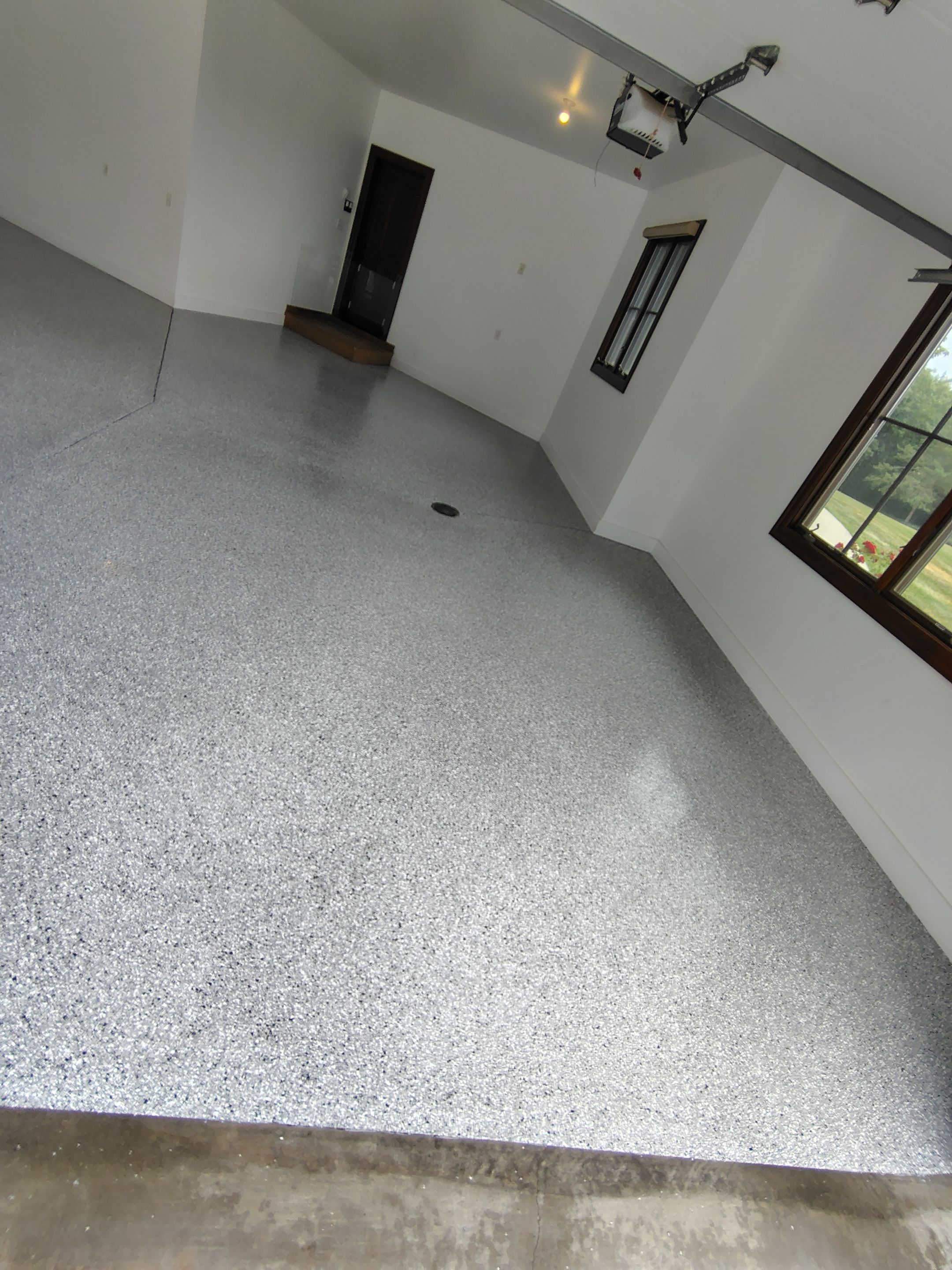 Feather Grey Floor Coating in Sioux Falls, SD by Select Painting, Coatings & Garage Cabinets