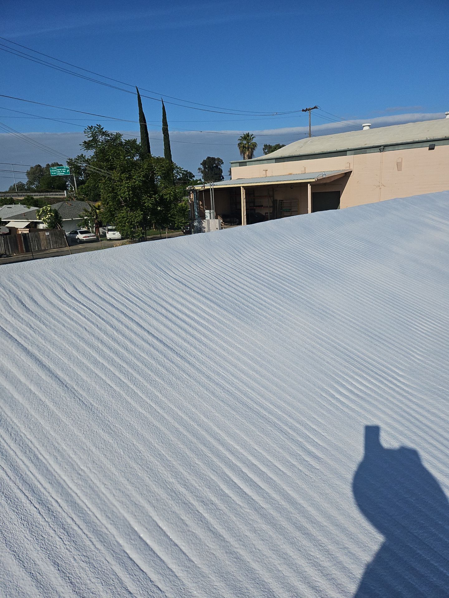 Spray foam and coatings using Conklin Benchmark/PUMA XL by Straight Edge Roofing Inc