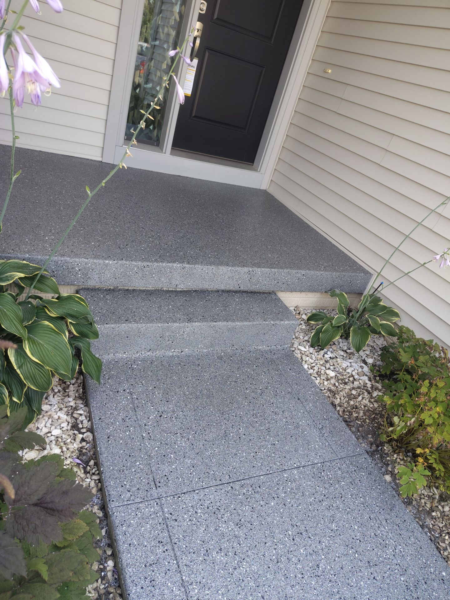 Residential Garage and Front Entry Concrete Coating in Nevada, Iowa by Revival Concrete Coatings