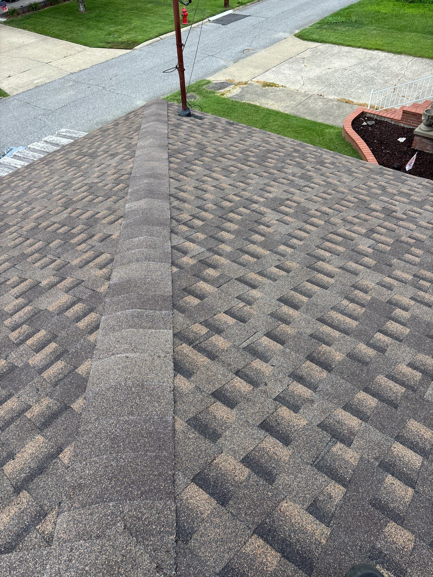 Residential Roofing Installation using GAF Timberline HDZ Barkwood by Rainstoppers Roofing