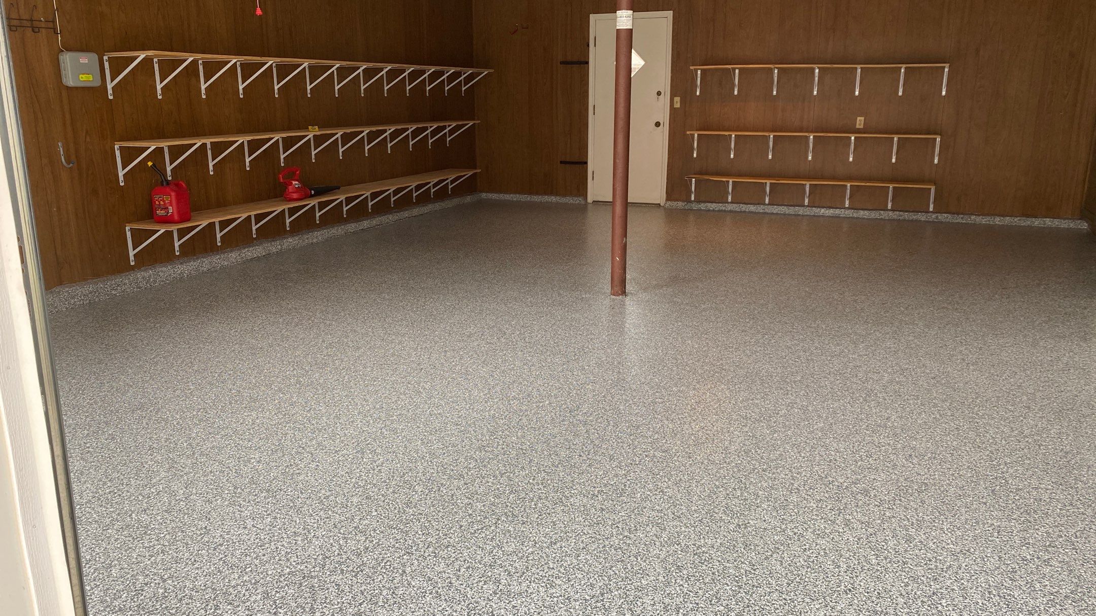 Mary Z. gets a new garage floor! by Banner Garage