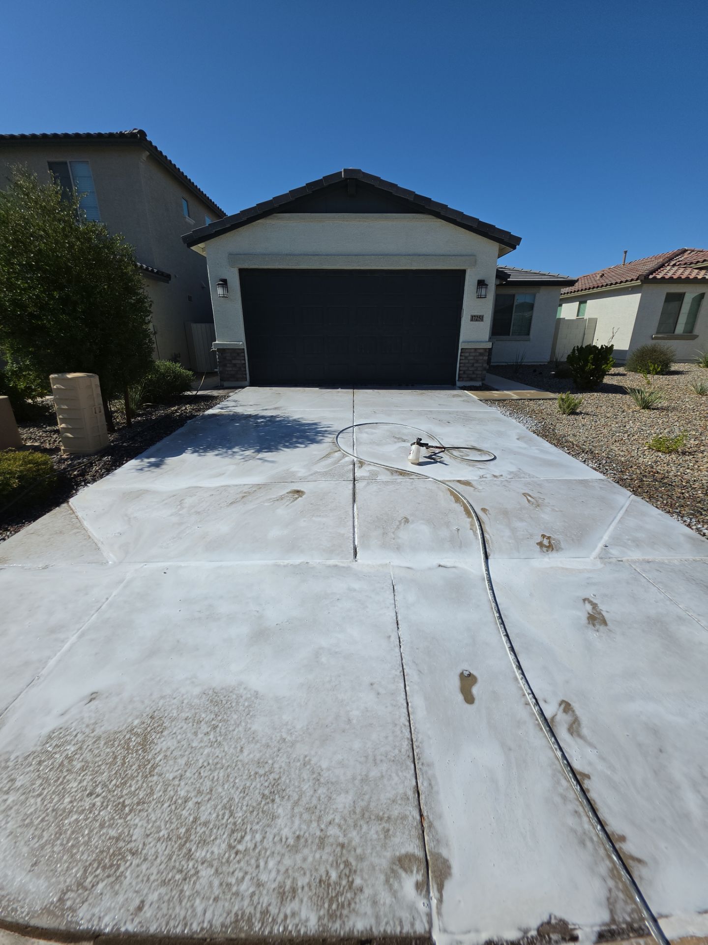 Driveway Oil Stain & Rust Removal | Surprise, AZ 85388 by Patriot Power Washing & Sanitation