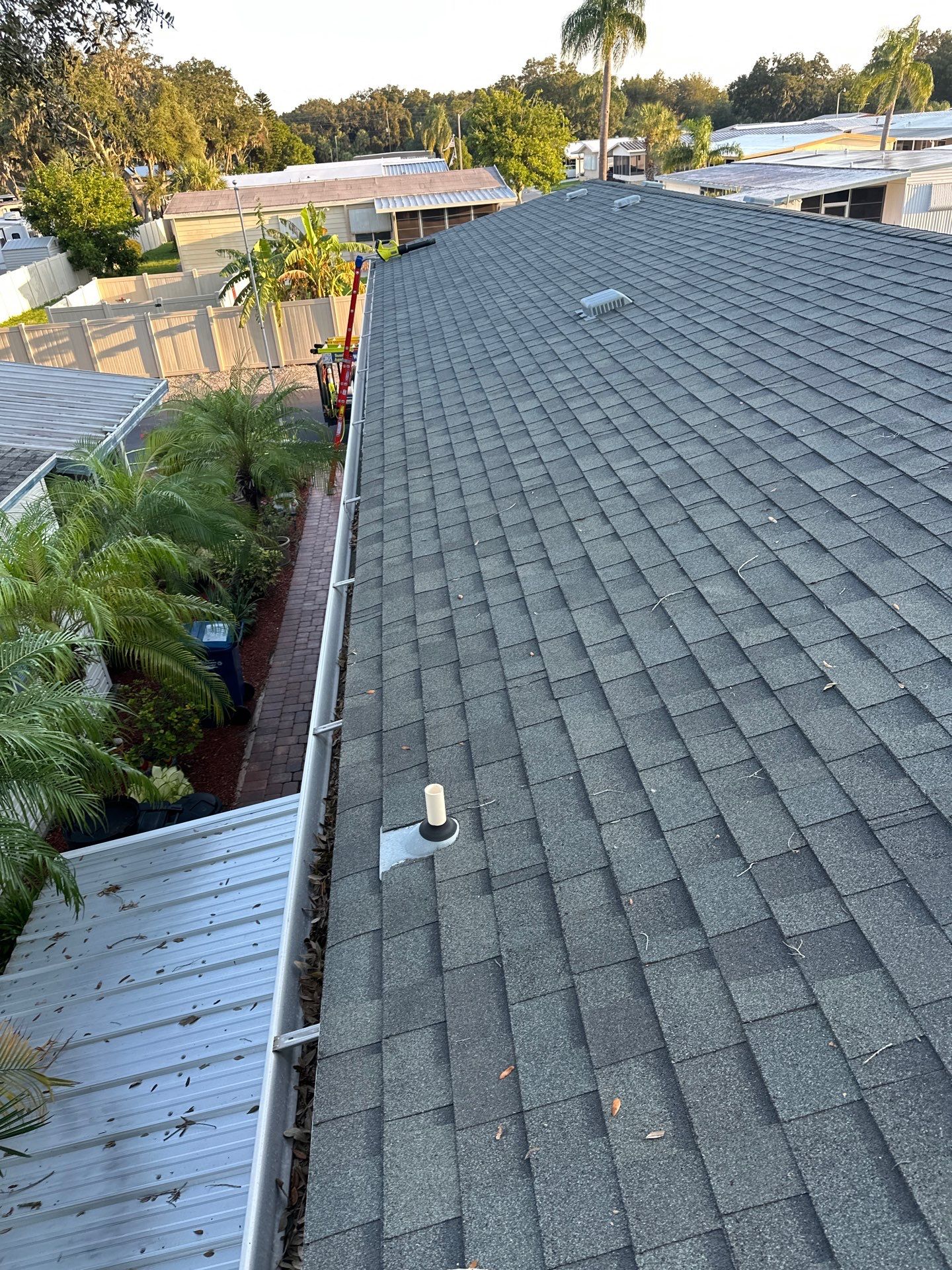 Gutter Cleaning and House Washing Services  by Sunshine AquaWash