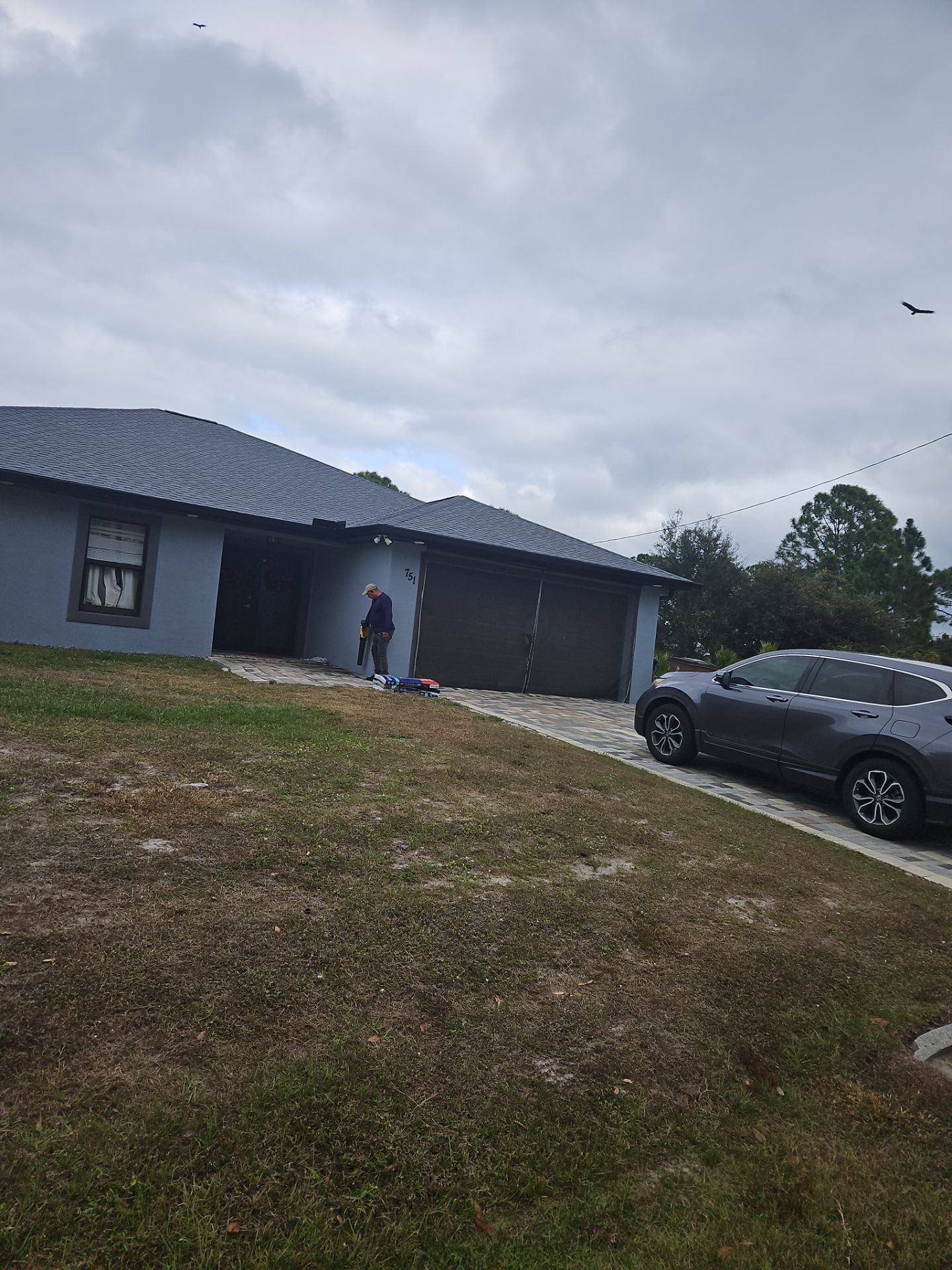 Black Seamless Gutters & Soffit/Fascia in Lehigh Acres FL by Gutter Professors