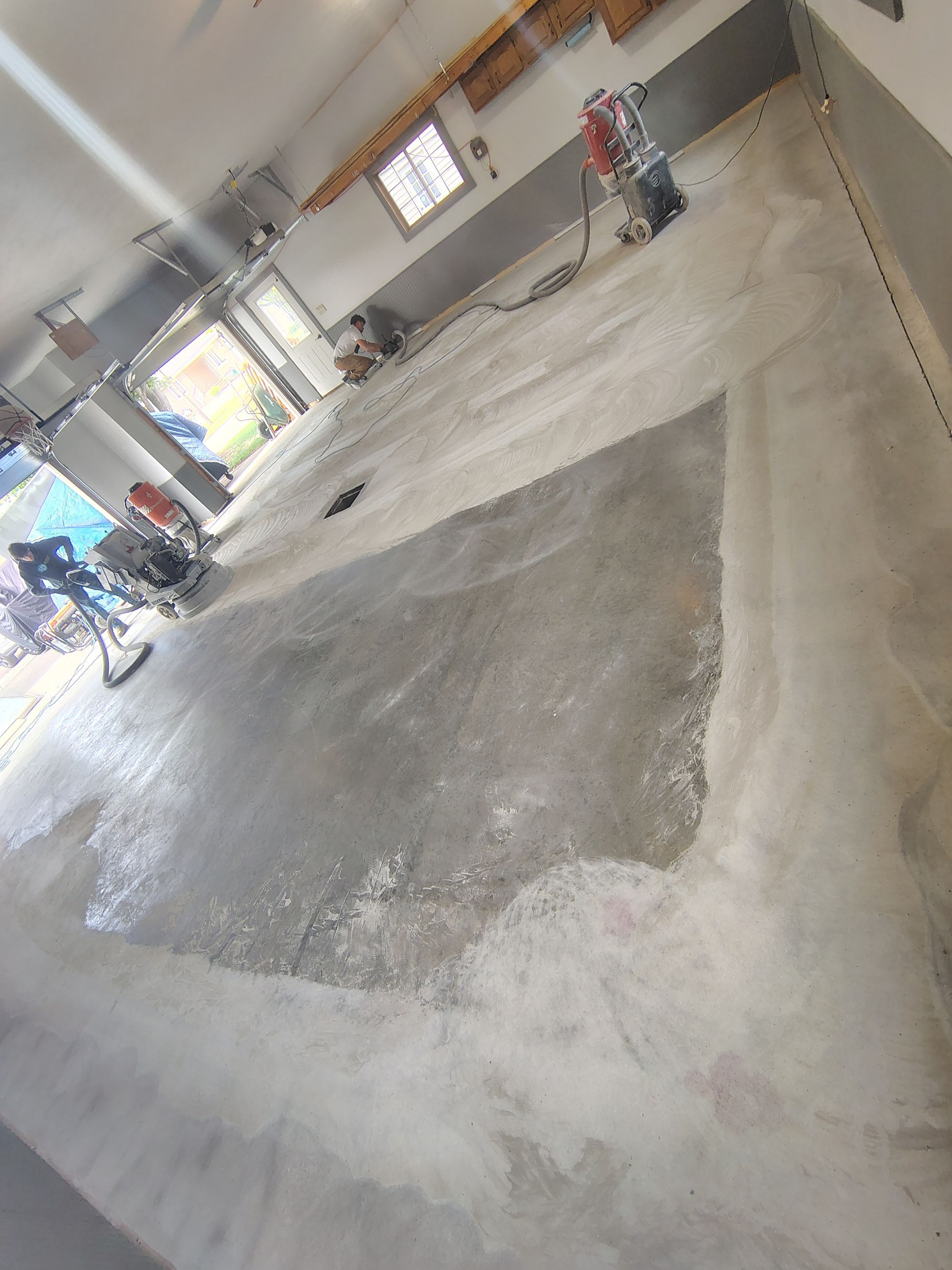 Multi-Fleck Epoxy Garage Floor Coating in Dell Rapids by Select Painting, Coatings & Garage Cabinets