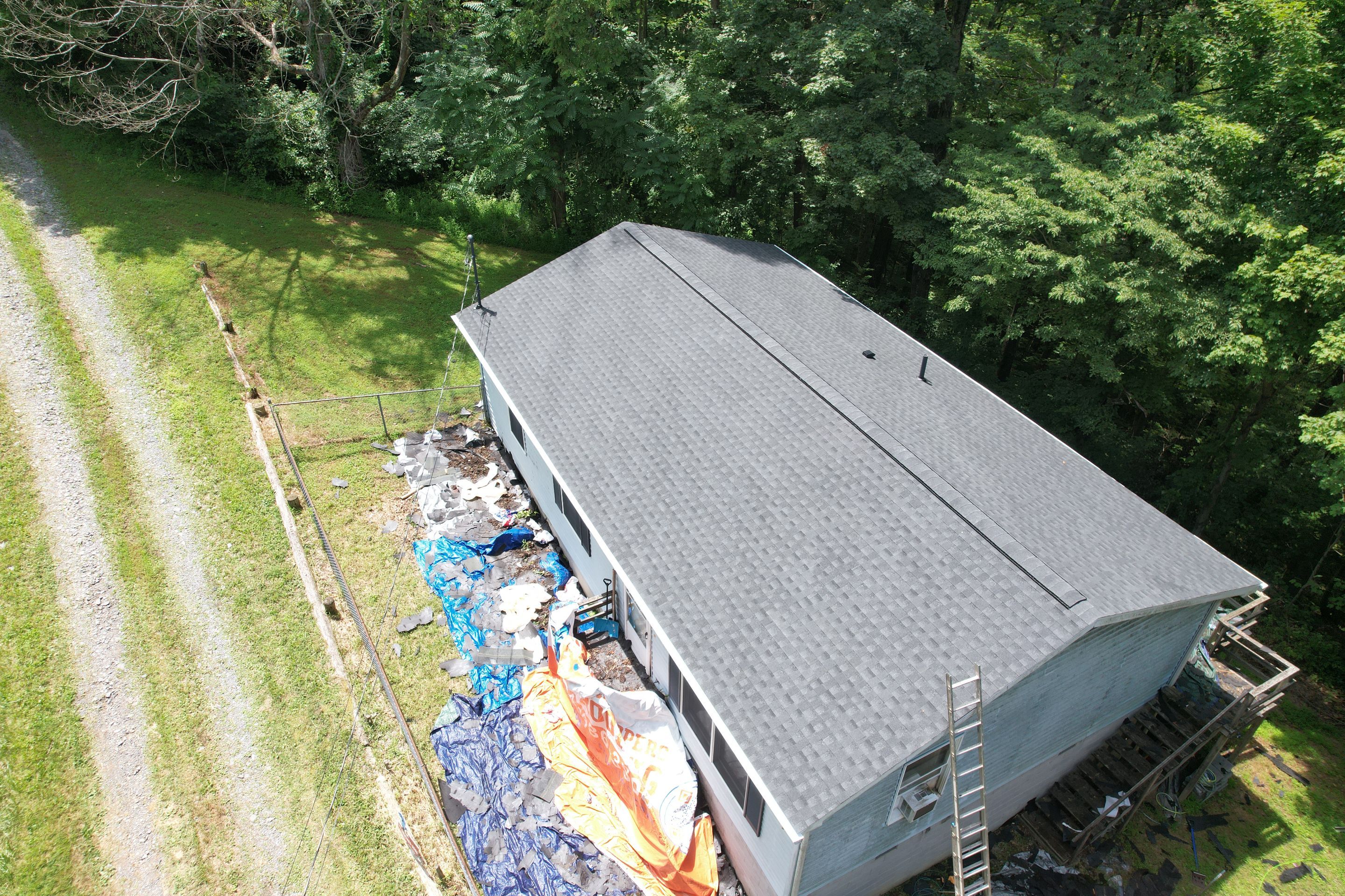 Residential Roofing Installation using GAF Timberline HDZ Charcoal by Rainstoppers Roofing