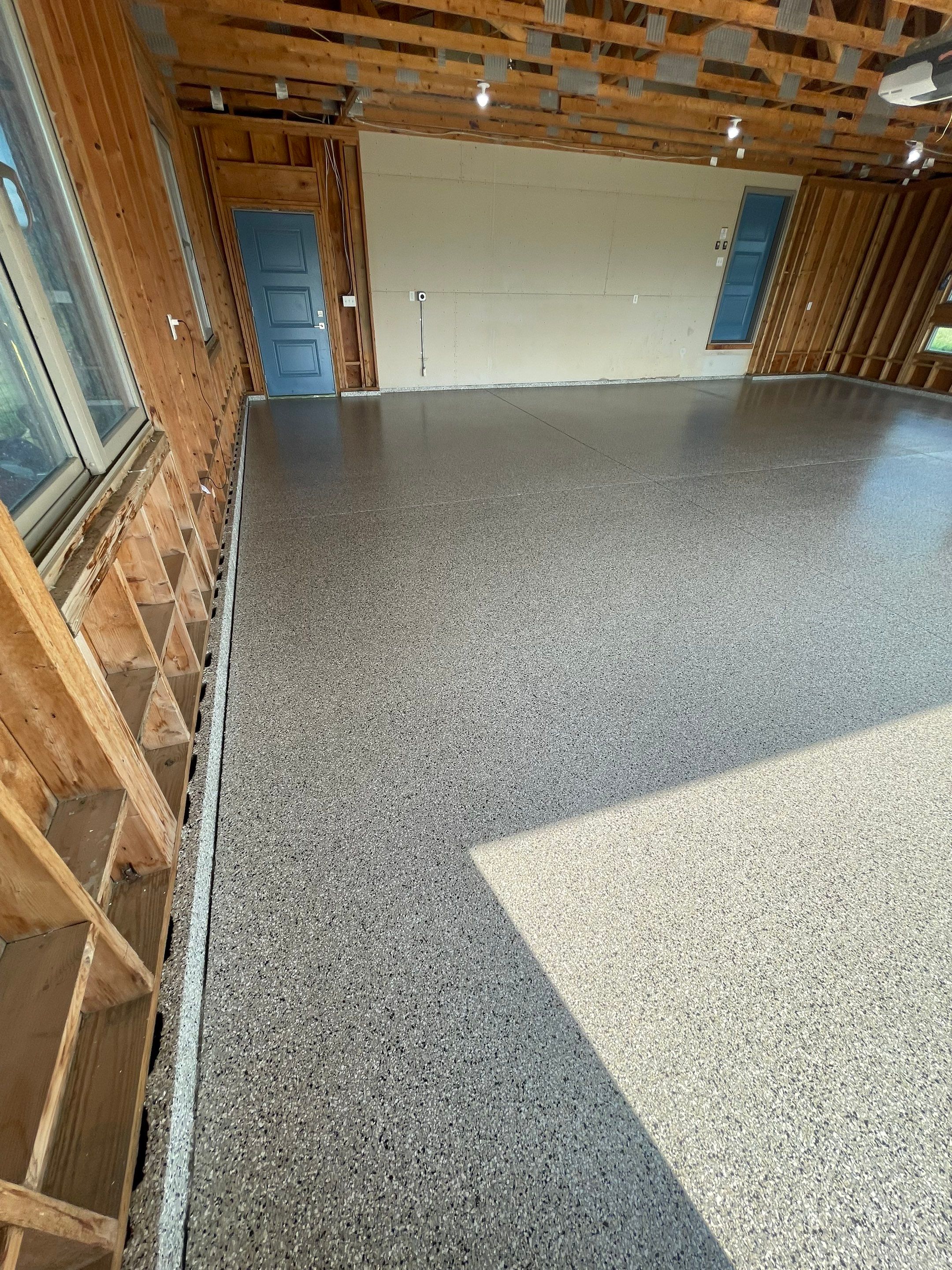 Cabin Fever Coating for Detached Garage in Dell Rapids by Select Painting, Coatings & Garage Cabinets