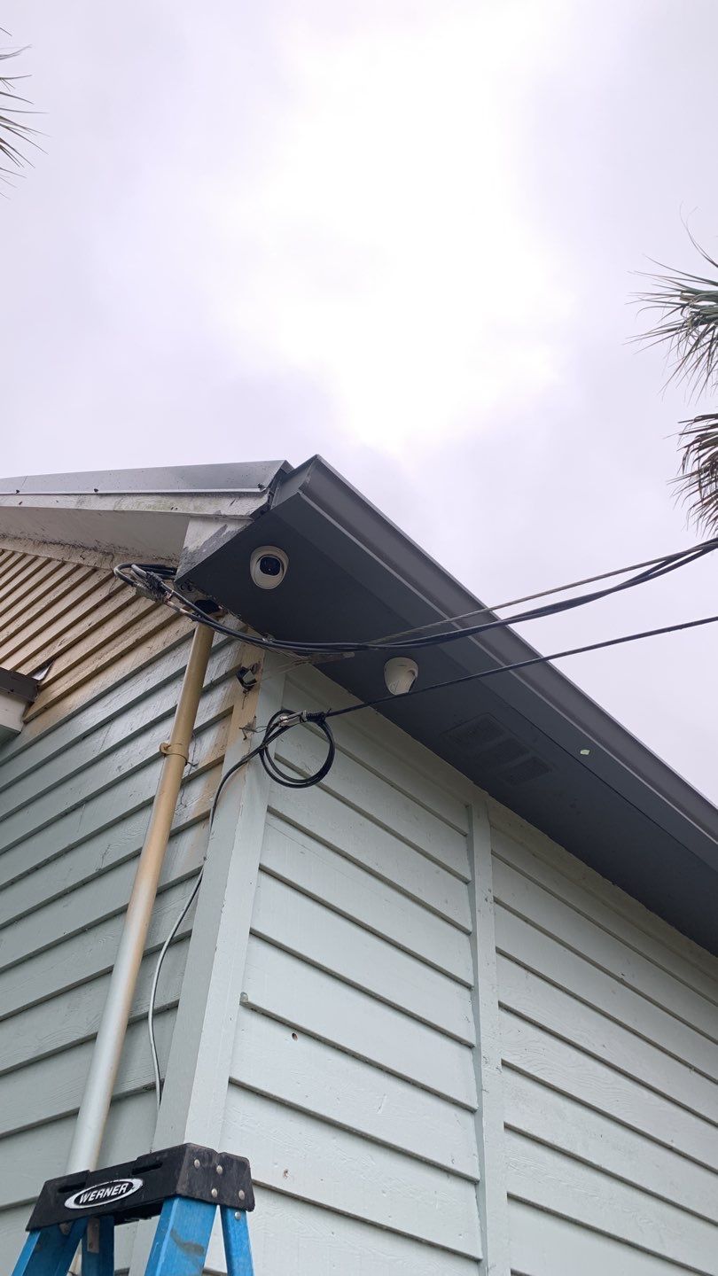 Seamless Gutter Installation using Charcoal Grey Gutters by Gutter Professors