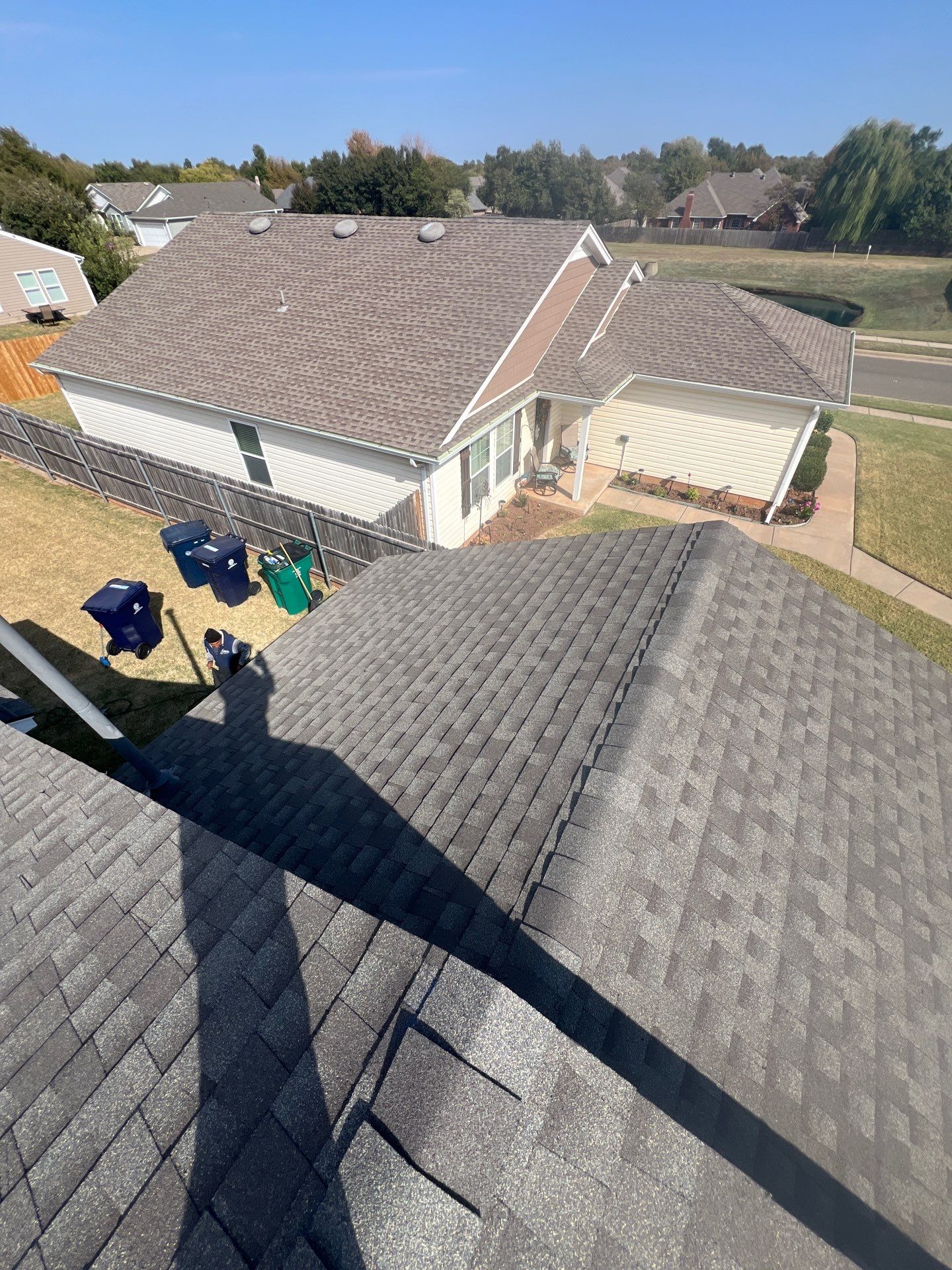 Roof Replacement and Gutter Installation in Edmond, OK by McCann's Roofing and Construction