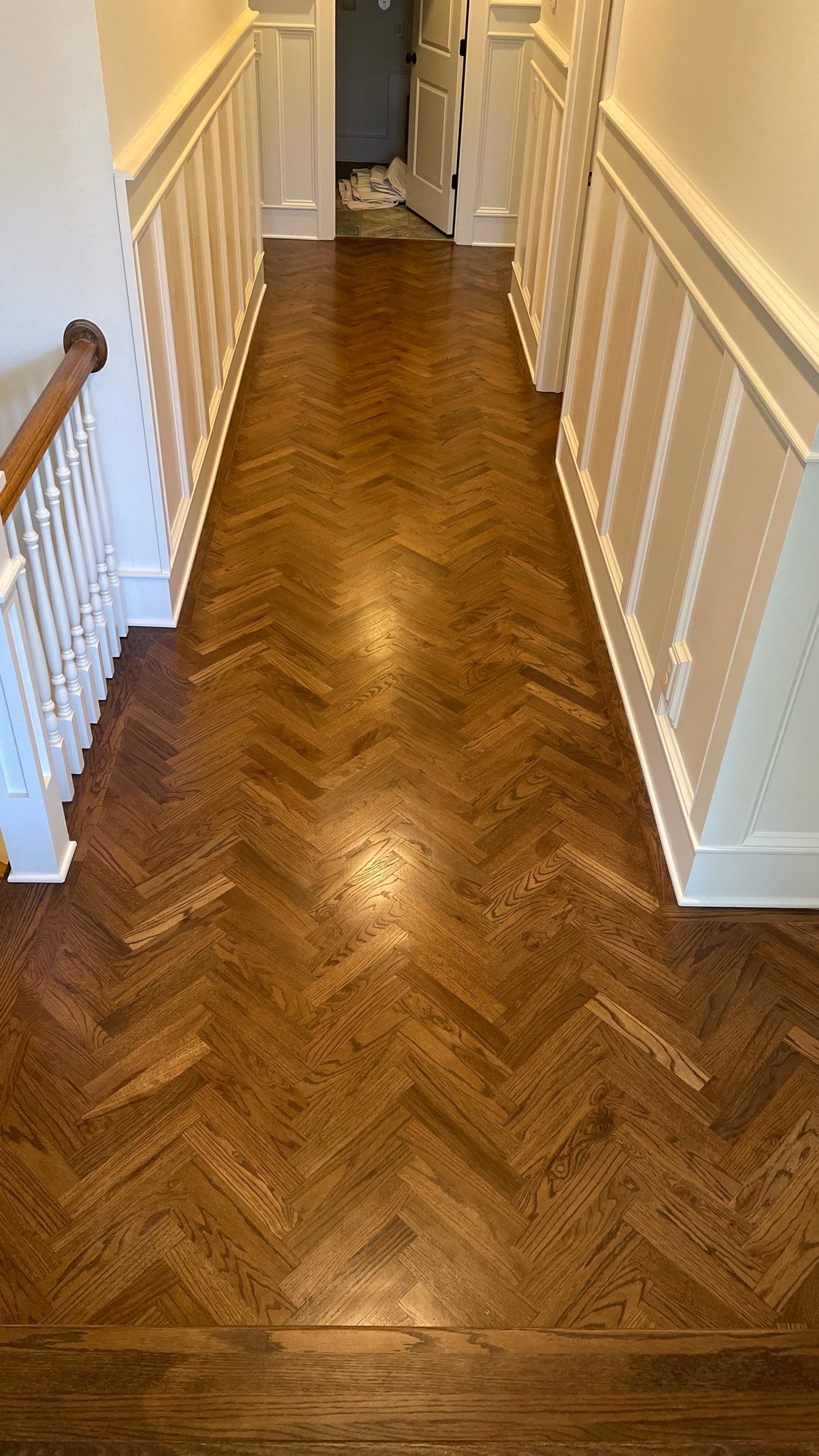 Herringbone Wood Hallway and Rooms by Footprints Floors of Coastal Carolina