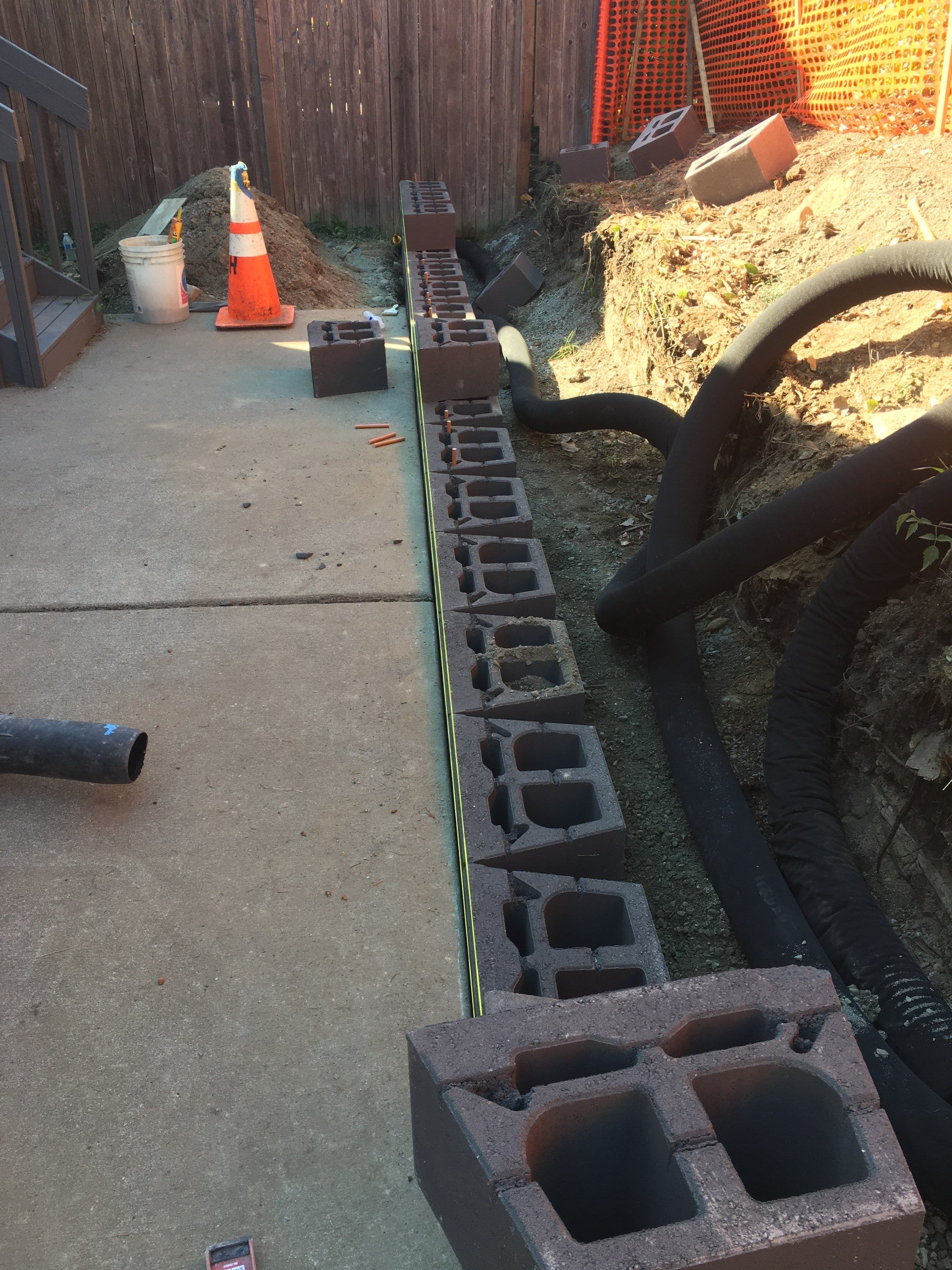 Jireh Outdoor Projects | Retaining Wall & Fence Build by Jireh Asphalt & Concrete Inc 