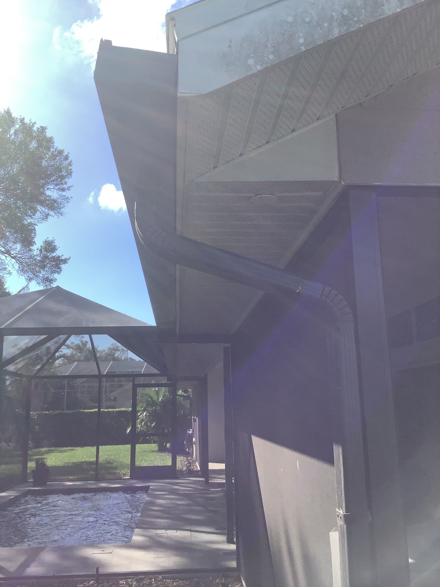 Black Seamless Gutters in Sarasota FL by Gutter Professors