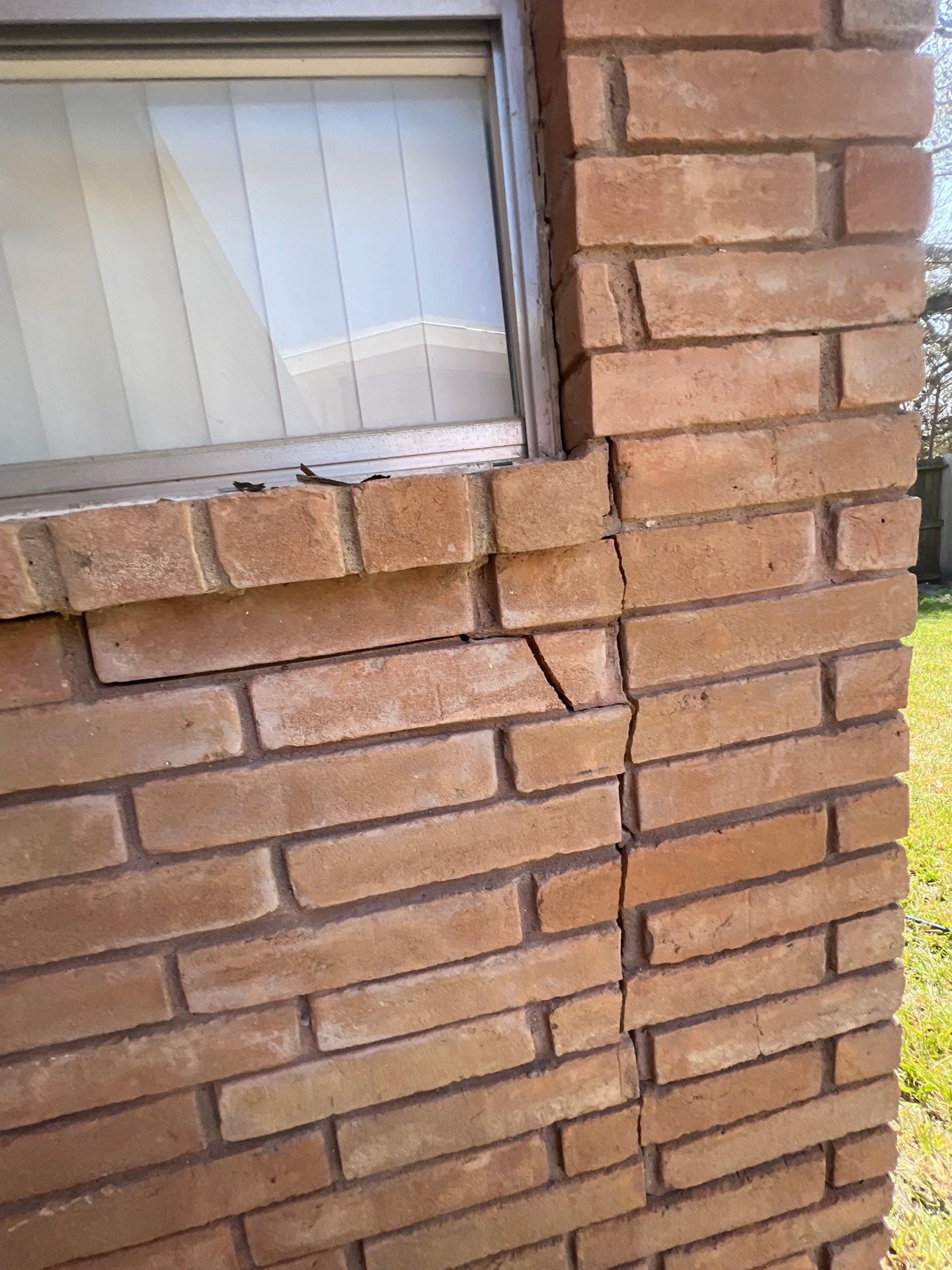 Windows in Brick with a Bay Window by Bayfront Roofing and Construction