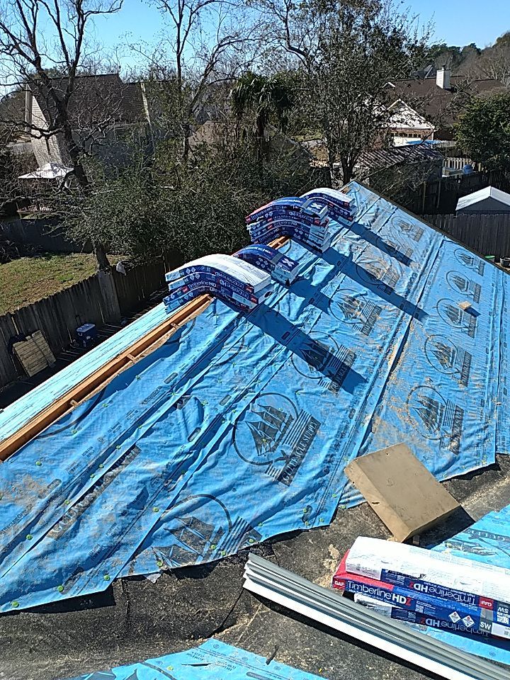 Residential Roofing Installation using Roof Replacement by American Roofing & Construction LLC