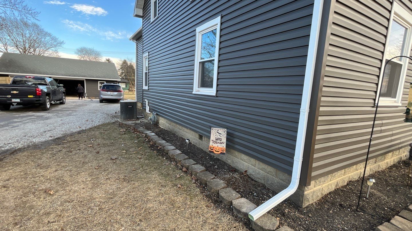 Residential fascia replacement using Exterior Portfolio 4.5 DL - Peppercorn by Nitro Roofing and Construction