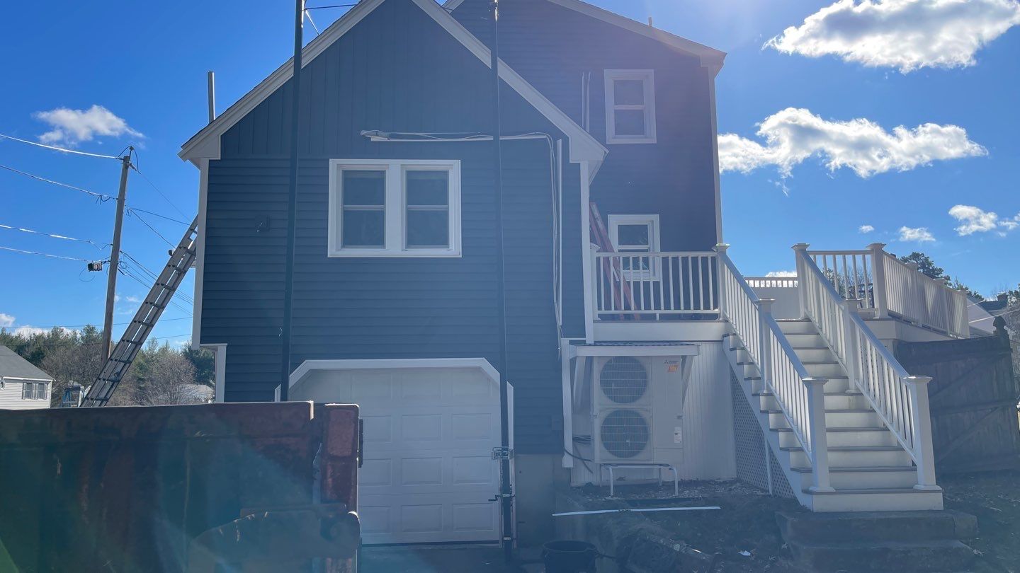 Complete Exterior Renovation with New Siding & Gutters   by Sensible Home Solutions