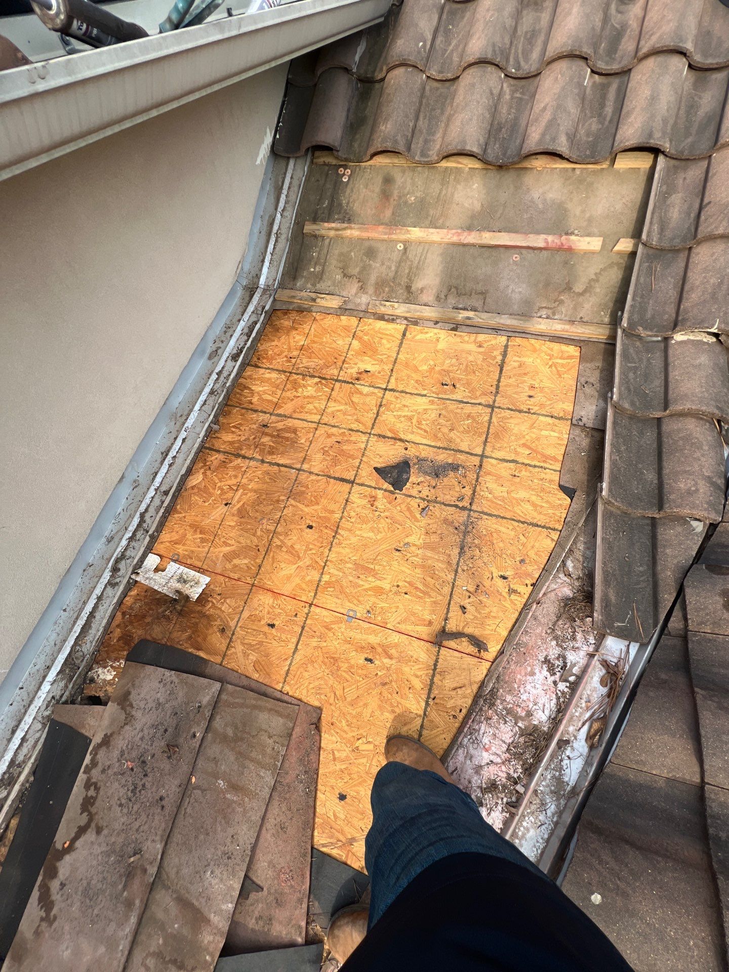 Residential Roofing Repair using tile by Roof Repair Company