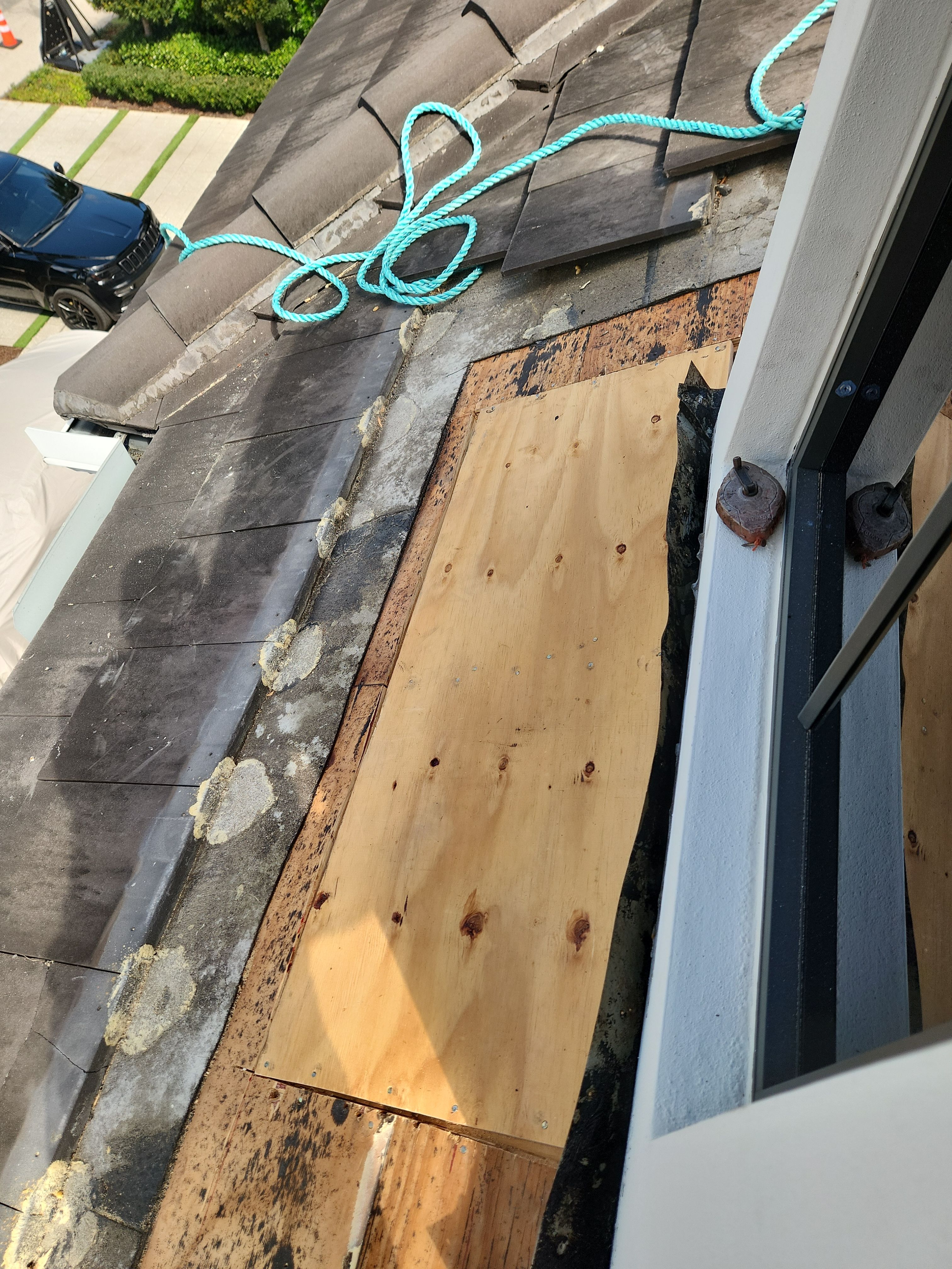 Silicone roof coating and tile tune up in Boca Raton by Aastro Roofing