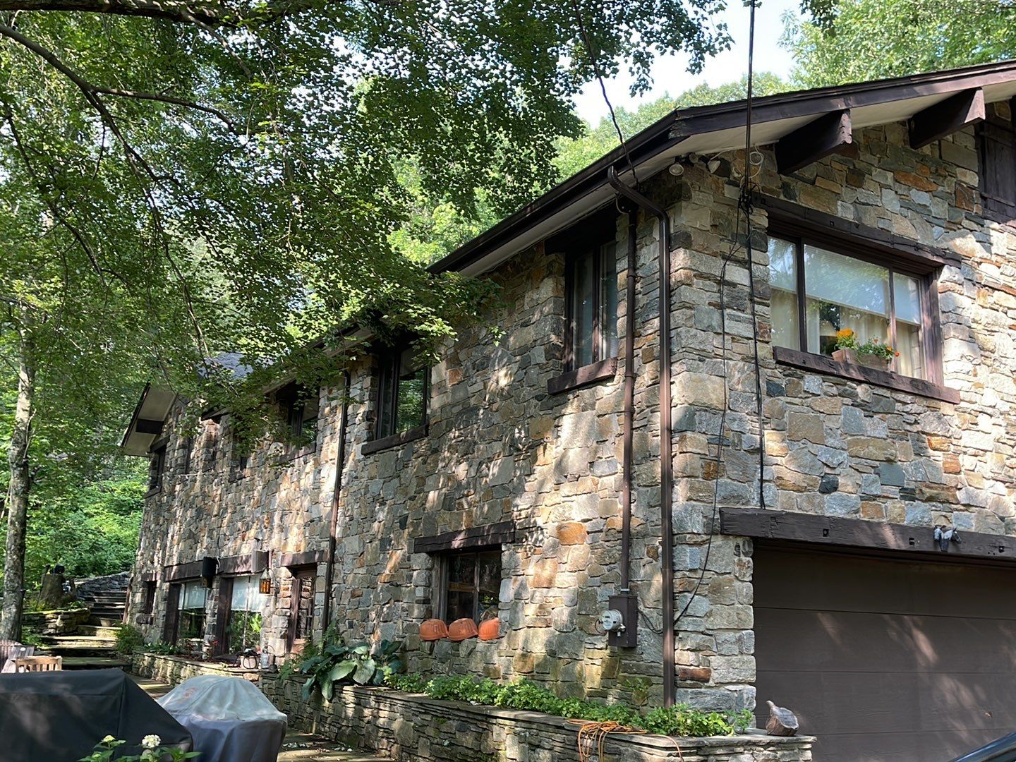 Gutter Installation using 5k Brown Gutters by A Plus Exterior