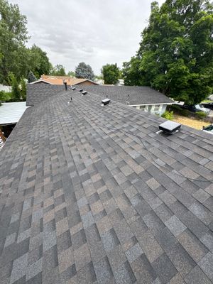 Residential Roof Replacement With Dark Gray Architectural Shingles in Mountain Home