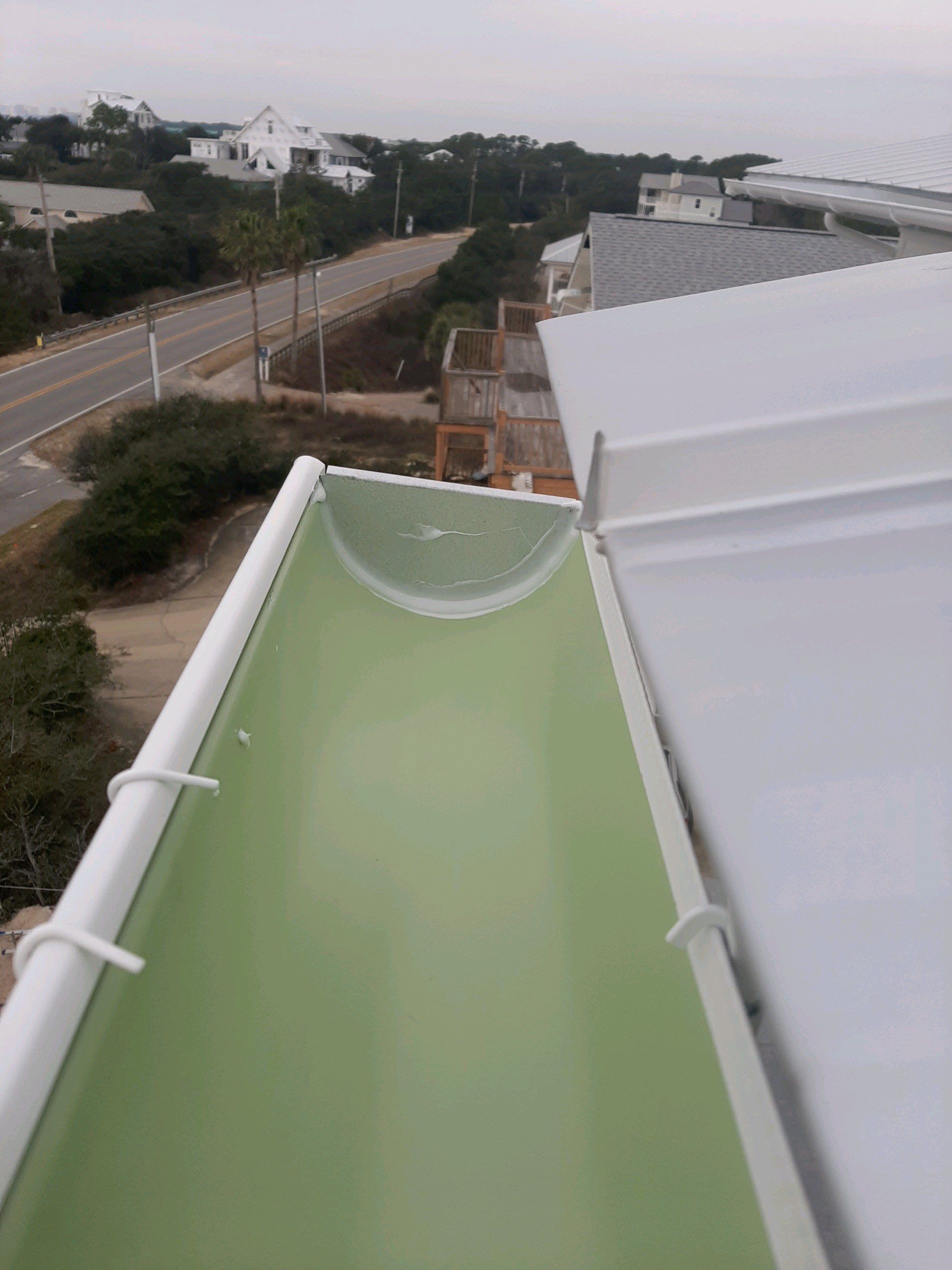 Gutter Installation Using 6 Inch Seamless Aluminum Gutters by Gutter Professors