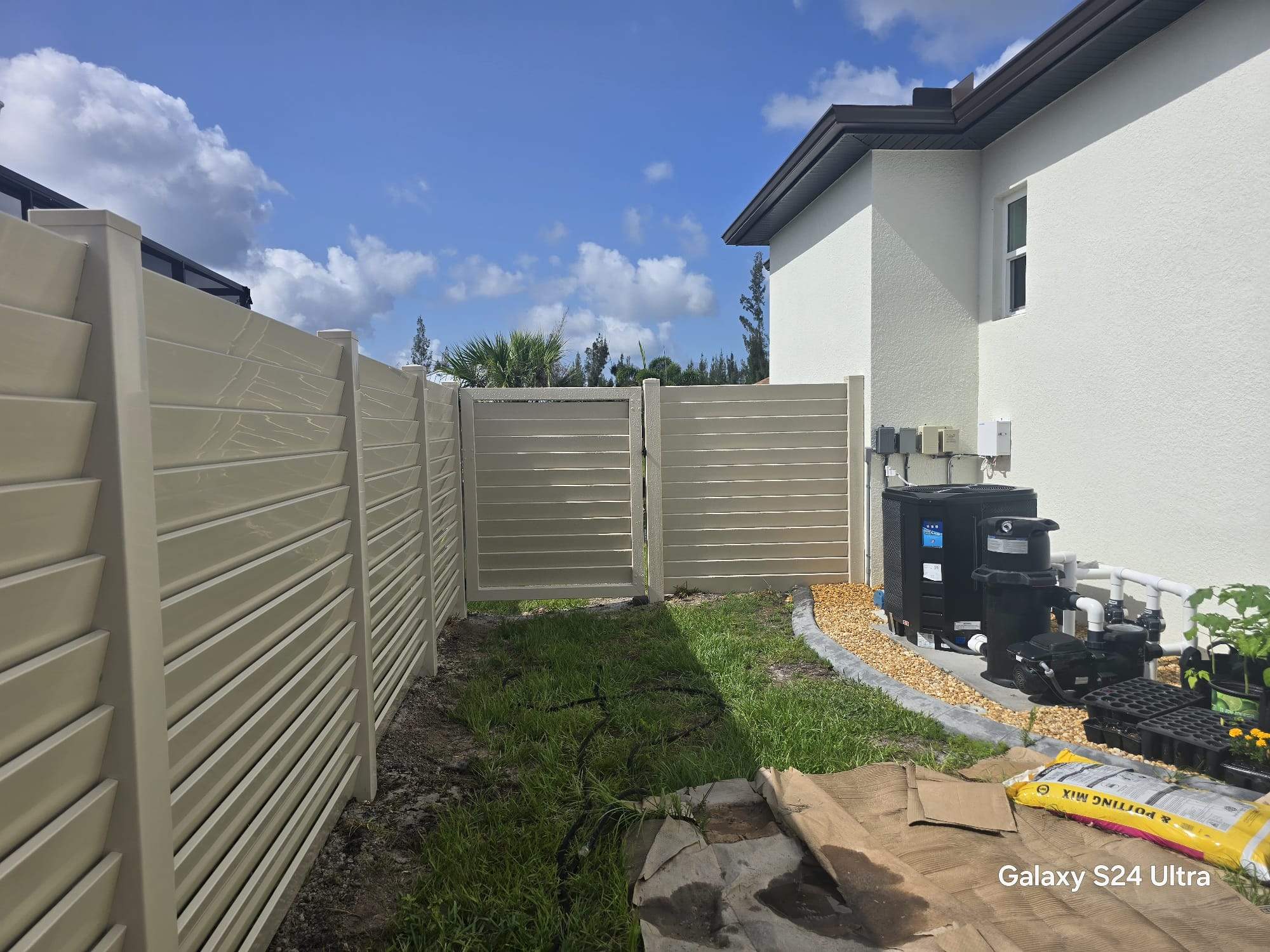 Tan Louvered Vinyl in Port Charlotte by True Fence LLC