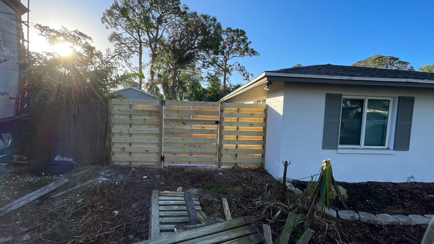 Wood Fence Installation using Horizontal Shadowbox Wood Privacy Fence by Asap fence and gates, LLC