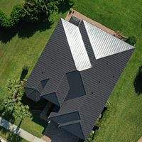 .032 Aluminum 1.5" Mechanical Seam Dark Bronze  by Total Roofing System The Metal Roof Experts