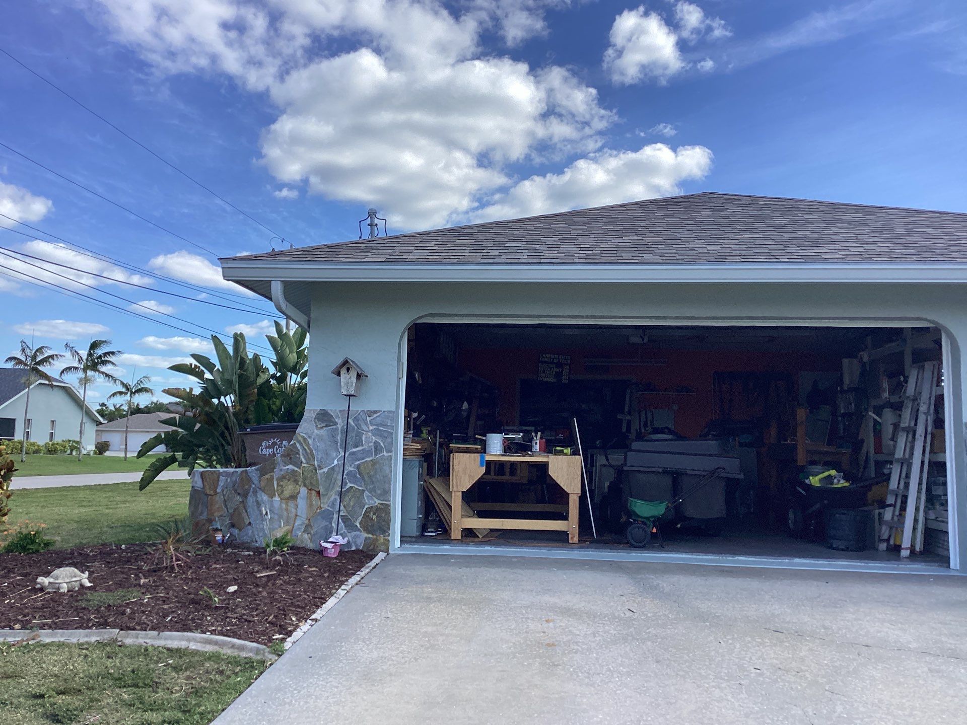 Downspout Installation using 3X4 Elbow Downspout in Cape Coral FL by Gutter Professors