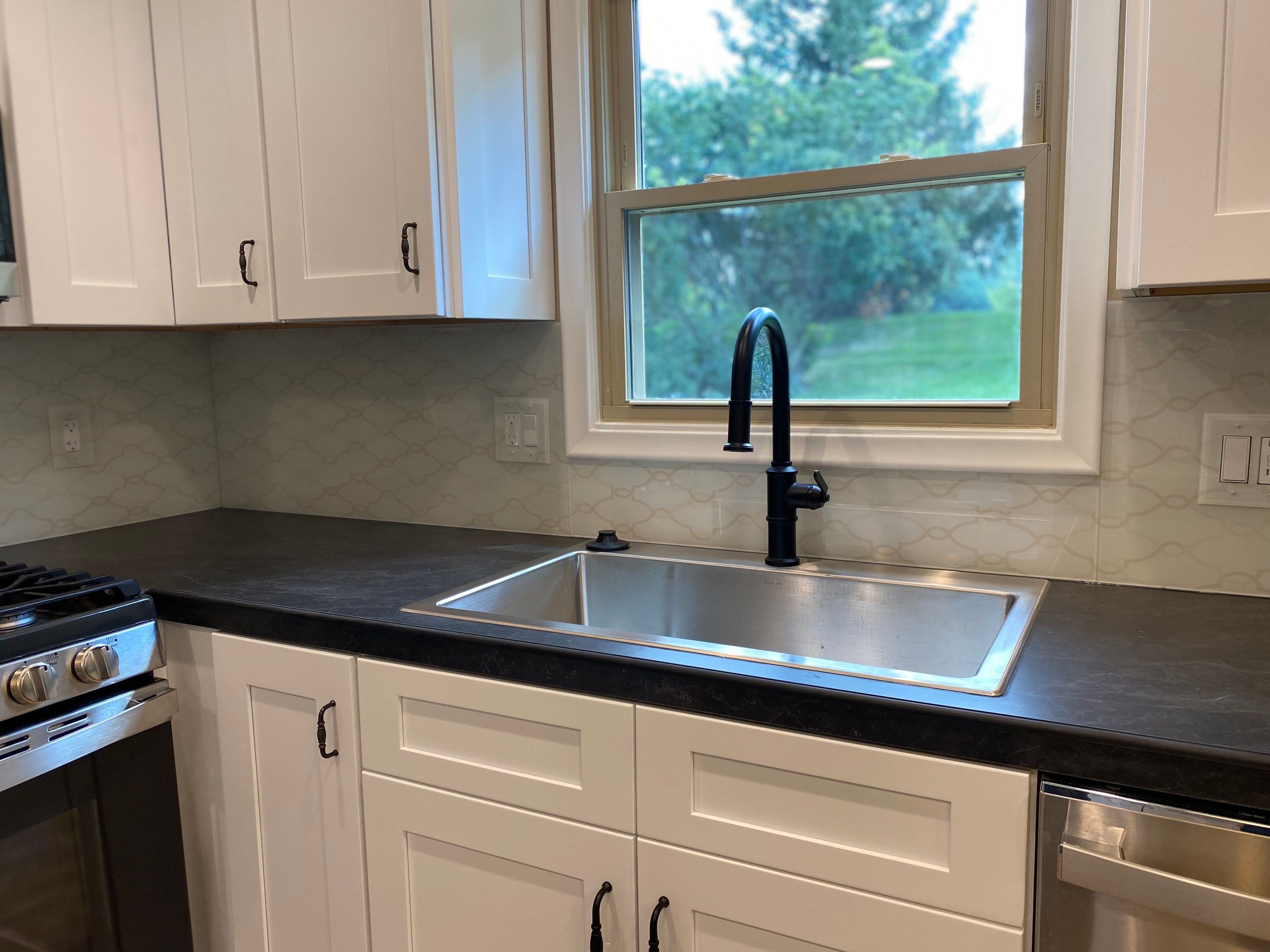 Kitchen Remodel using IMAGIO Arabesque Drops Solid Glass Backsplash by IMAGIO