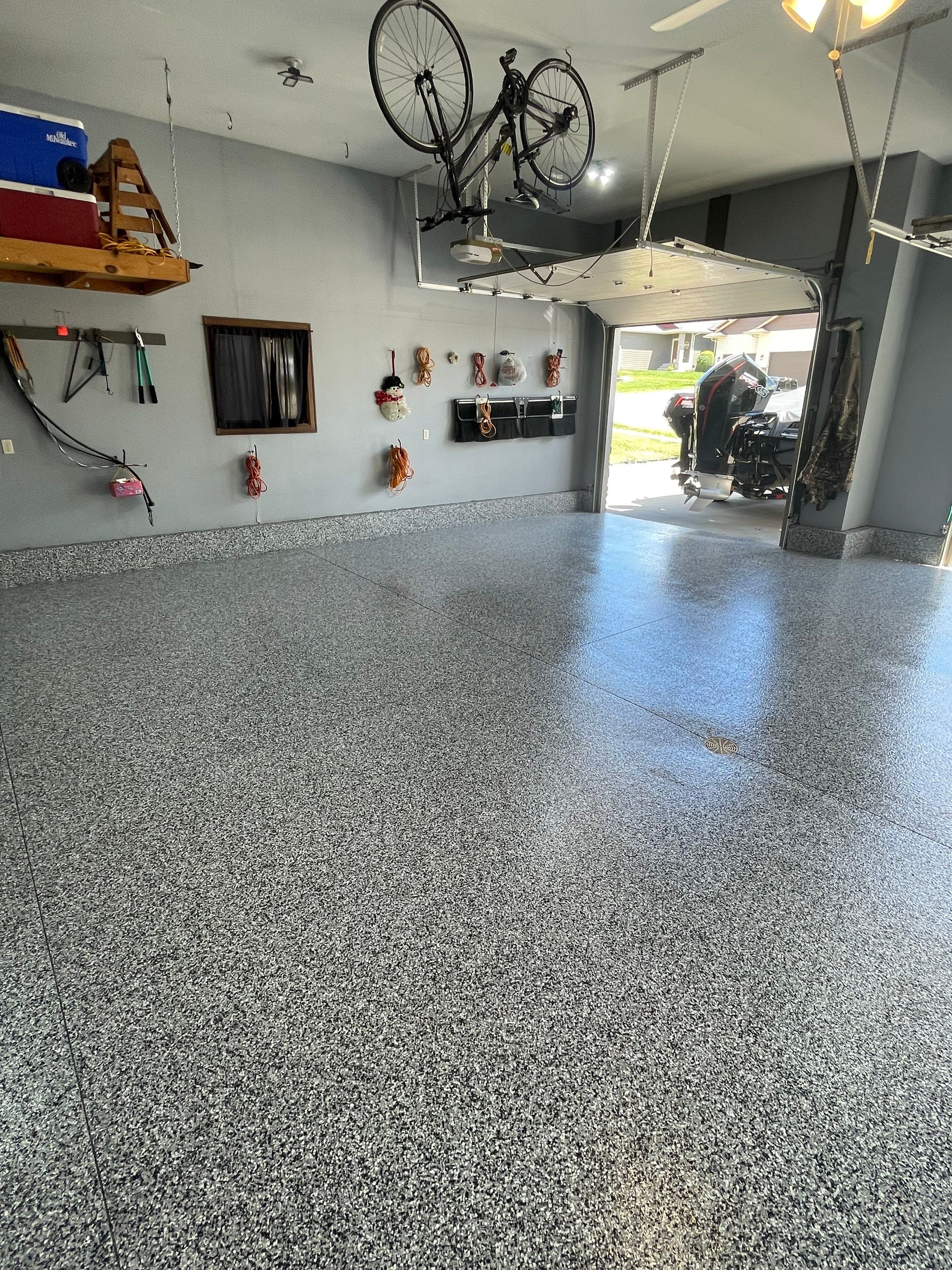 Residential Garage Floor Coating in Sioux Falls by Select Painting, Coatings & Garage Cabinets