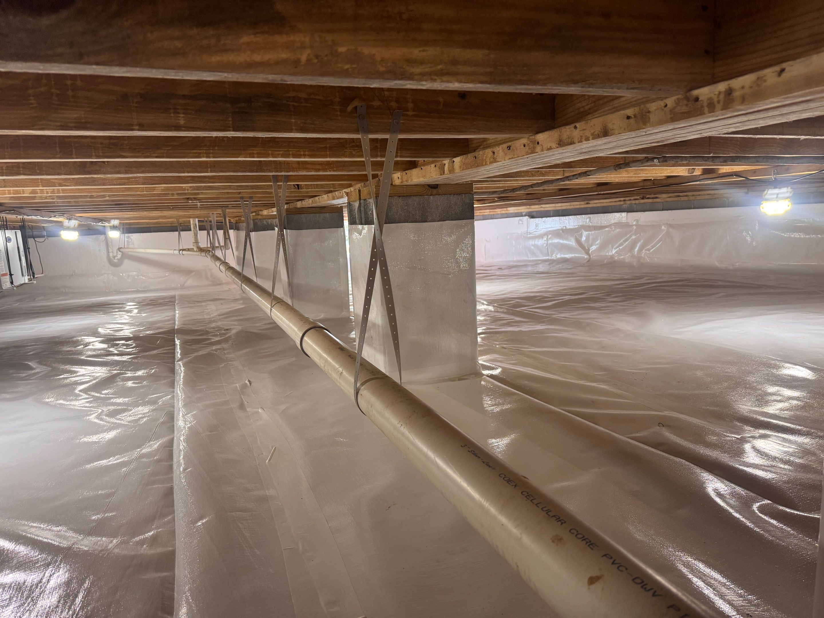 Premium Encapsulation with 20Mil, Borafoam insulation and Light System. by Impact Crawlspace