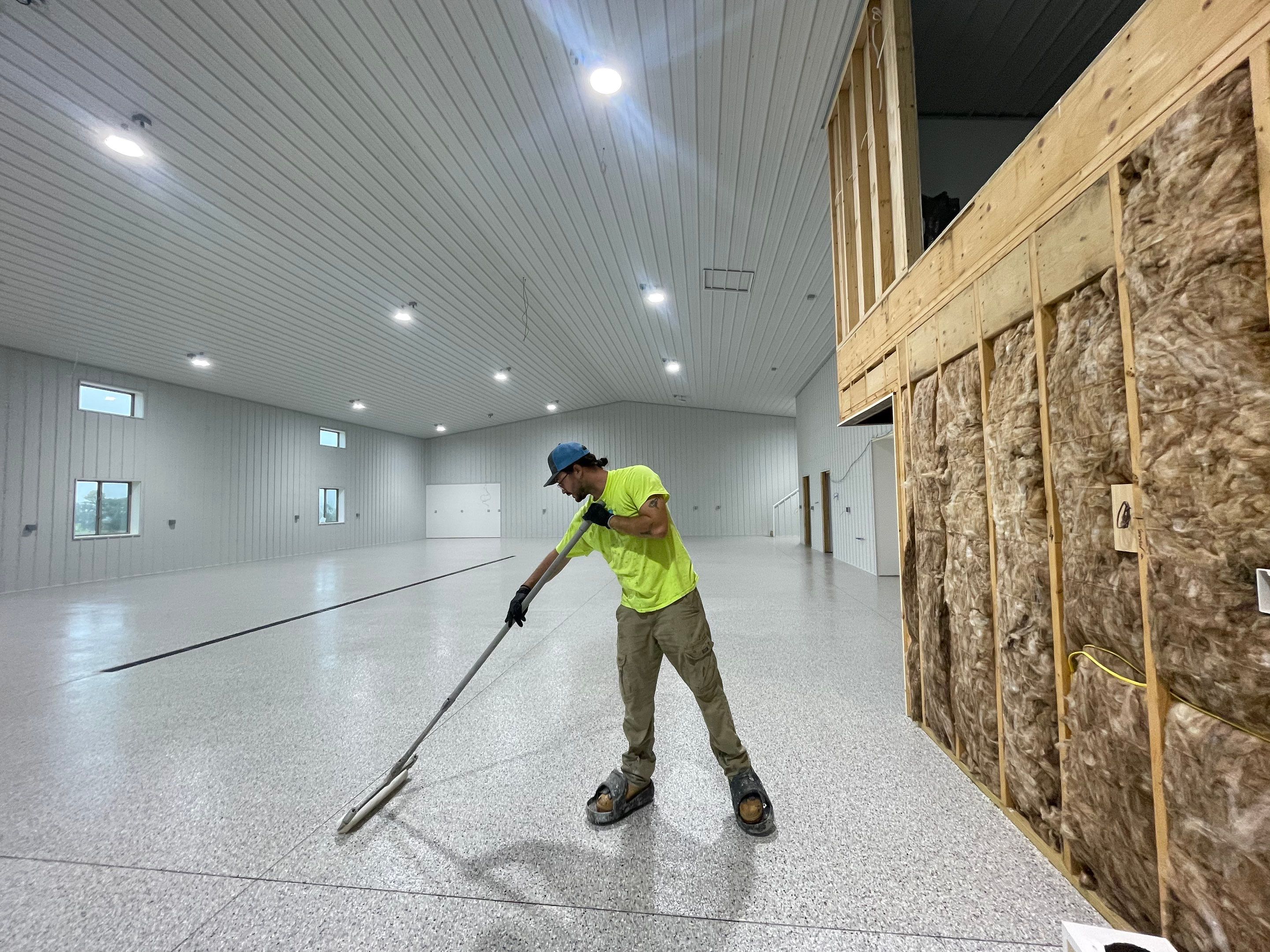 Custom Speckled Floor Coating for Large Montrose Shop by Select Painting, Coatings & Garage Cabinets
