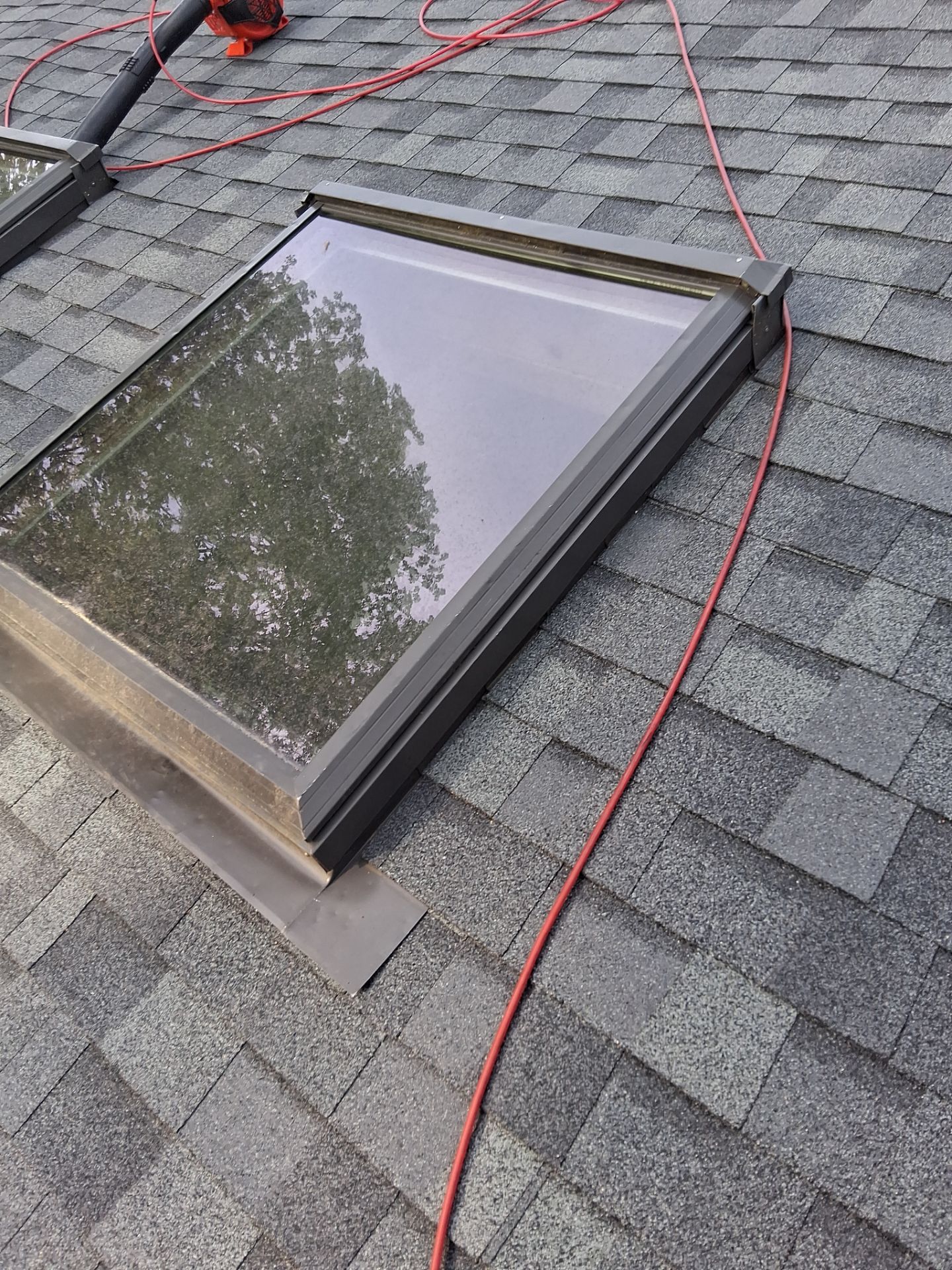 Asphalt Shingle Roof Replacement and Skylight Installation in Newport, NH by Tall pine roofing