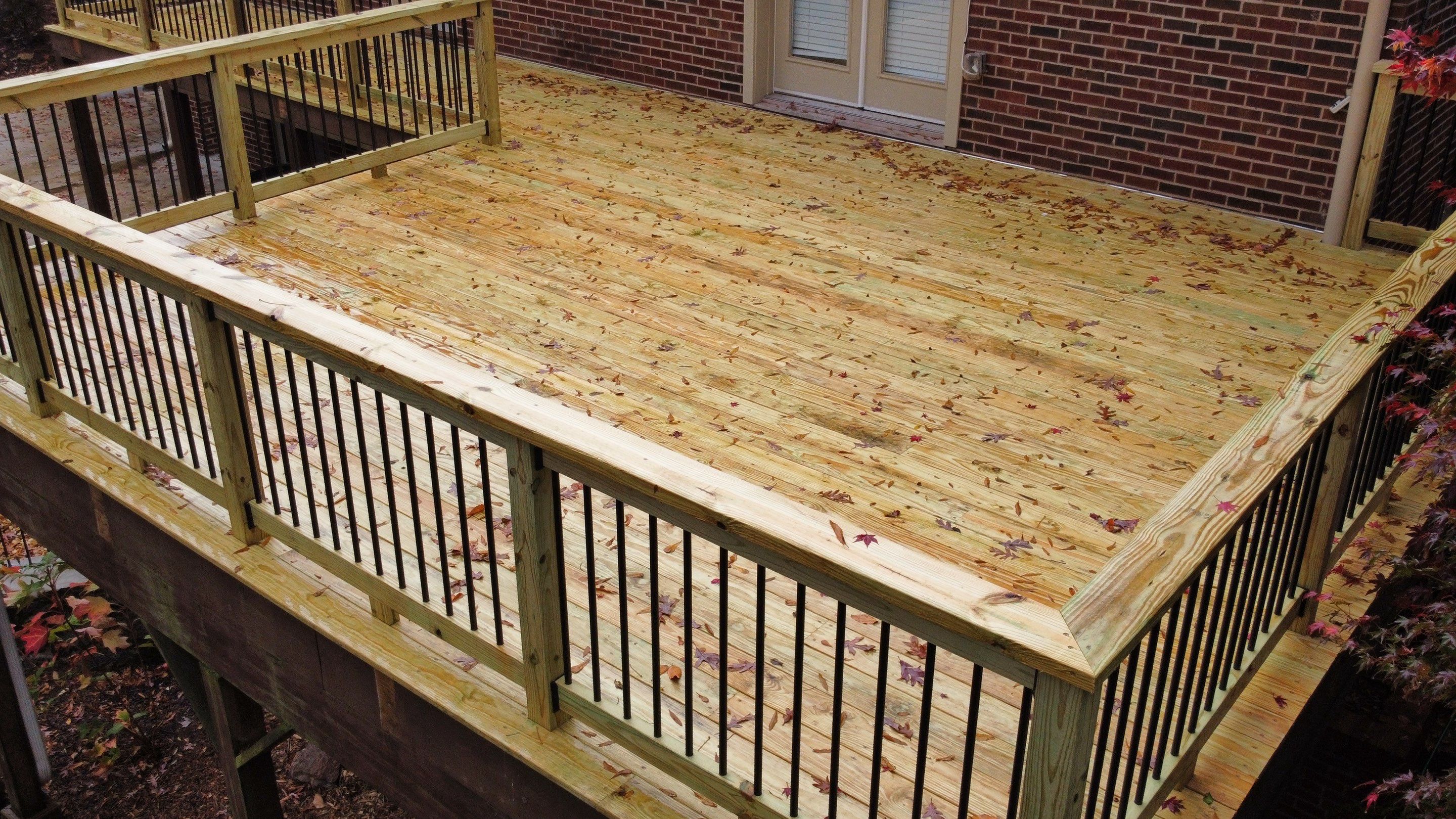 Pressure-Treated Wood Deck Replacement and Garden Bridge in Atlanta by Swift Home Renovations