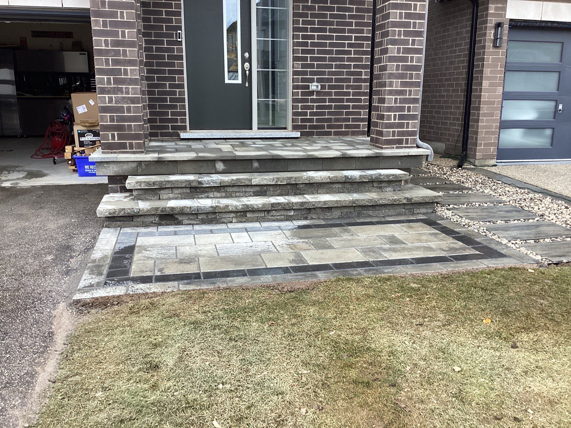 Front Entrance & Lounge Patio by Soares Landscaping