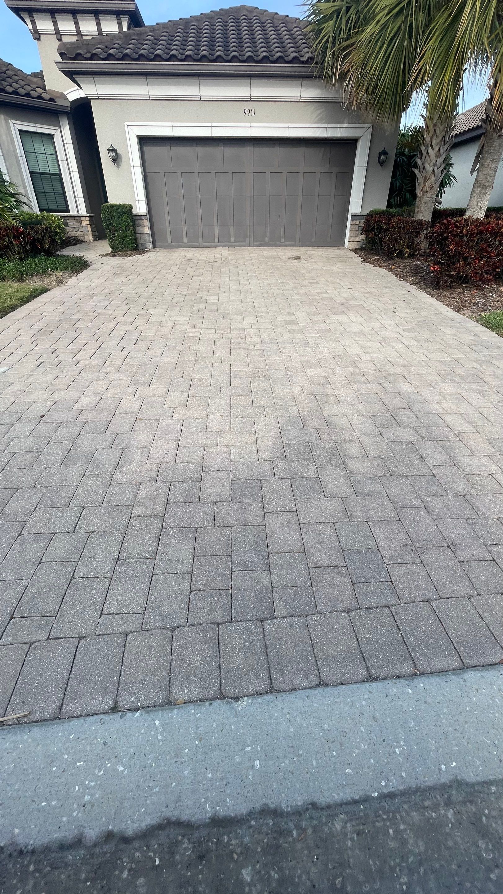 Concrete Tile Roof, Paver Pool Deck, Screen Enclosure & Driveway Cleaning in Artisan Lakes Esplanade, Palmetto, FL | Sunshine AquaWash by Sunshine AquaWash