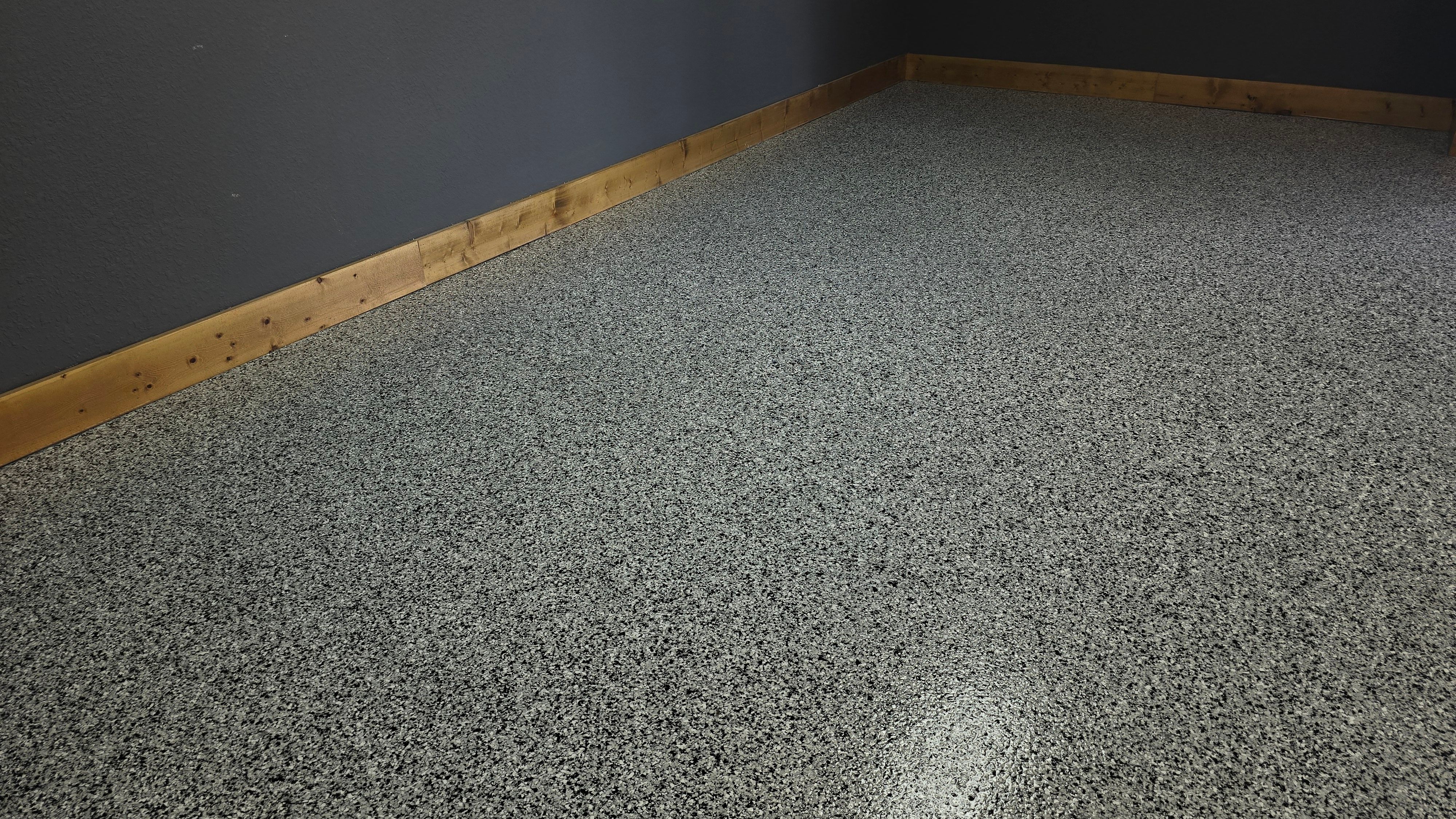 Garage using Houndstooth by Elite Floor Solutions