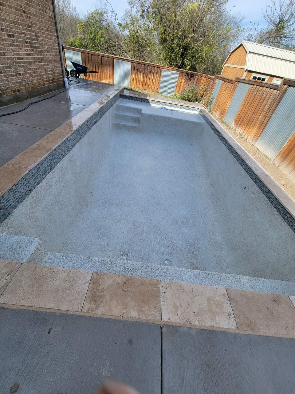 Contemporary Rectangular Pool with Travertine Coping by Pinnacle Pools and Spas - DFW