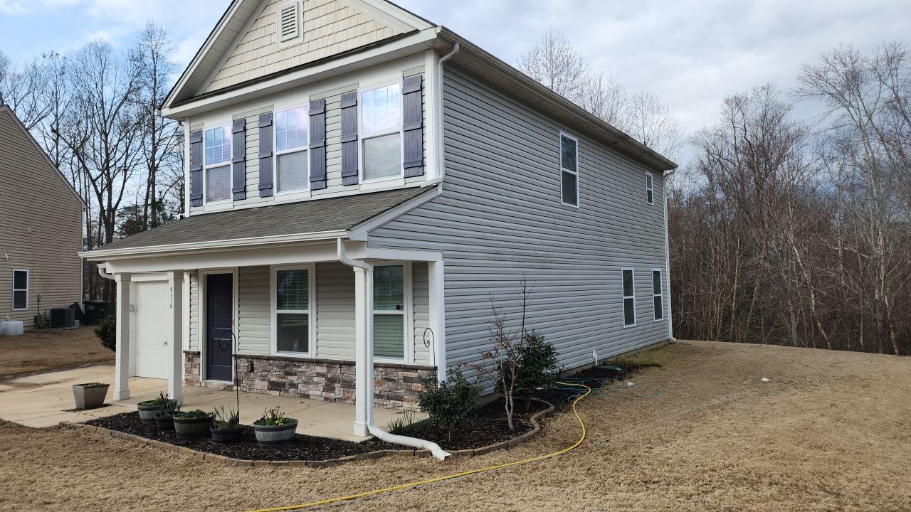 House Wash using cleaner by Power Wash Masters LLC