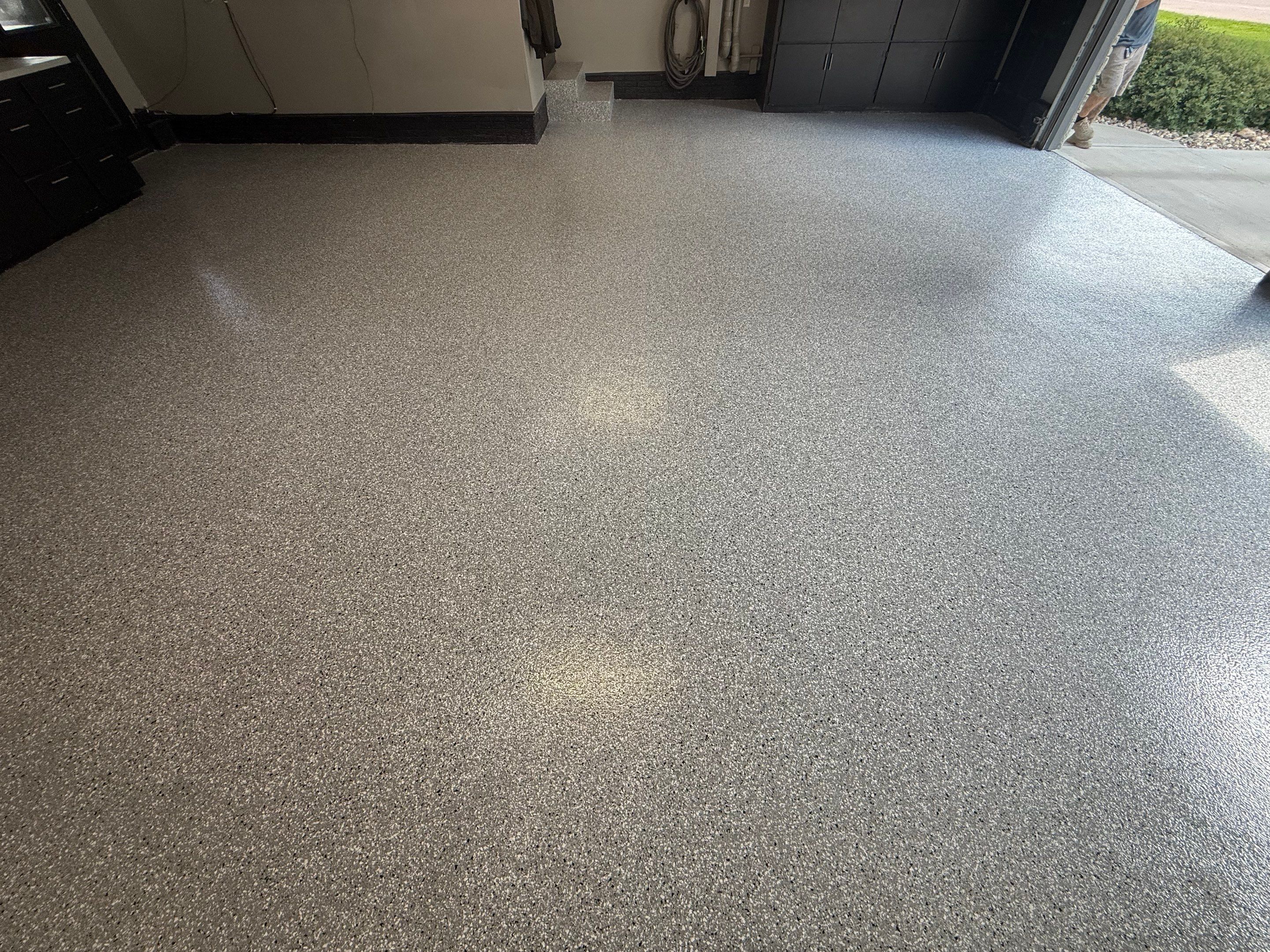 Garage Floor and Textured Pool Deck Coating in Sioux Falls by Select Painting, Coatings & Garage Cabinets