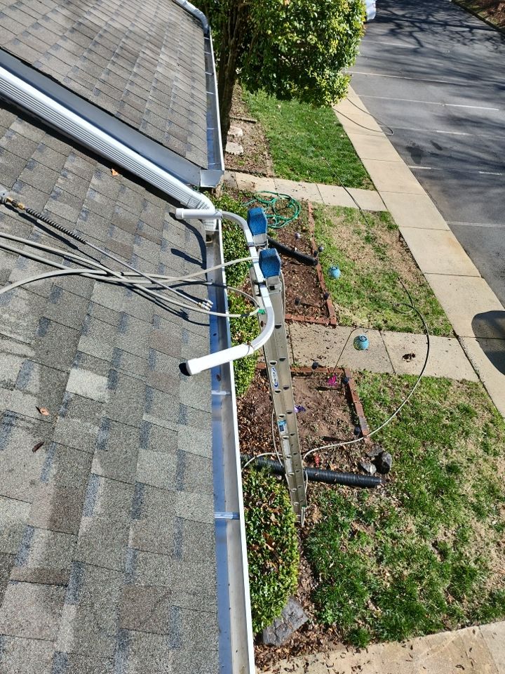 Gutter Cleaning using water by Power Wash Masters LLC