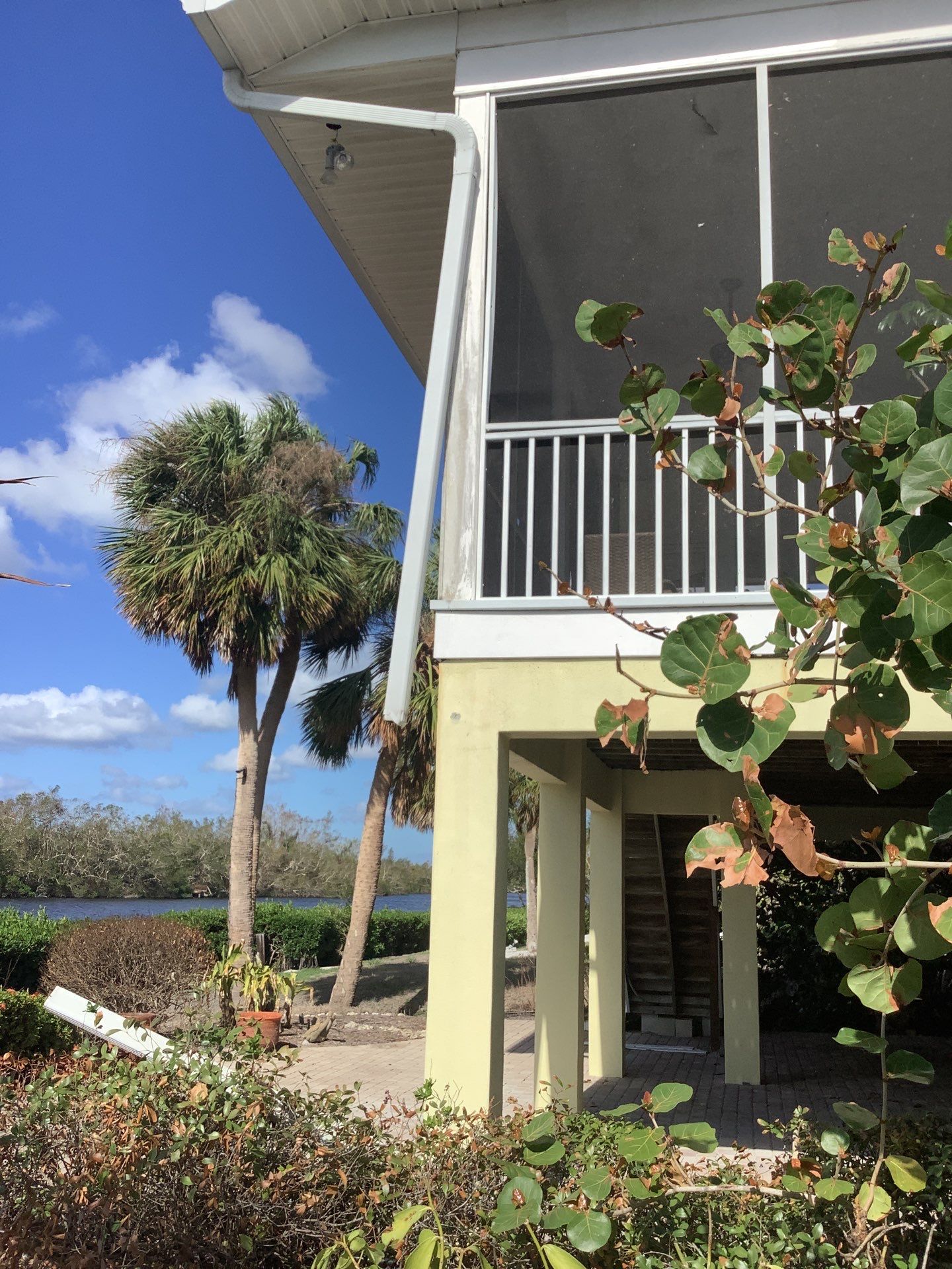 White Gutters with Matching Downspouts in Sarasota FL by Gutter Professors