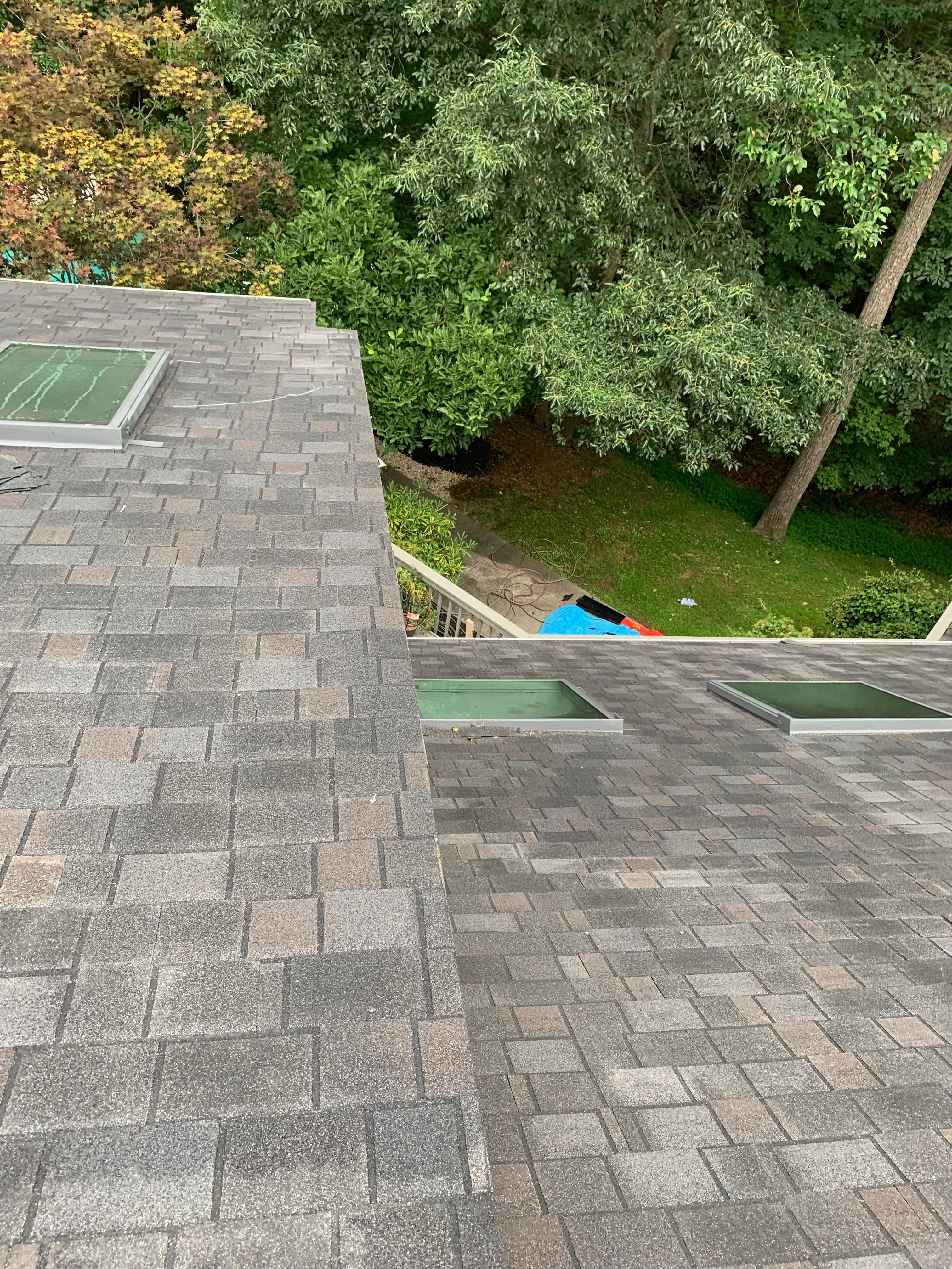 Skylight, Roof, and Gutter Replacement by American Home Contractors