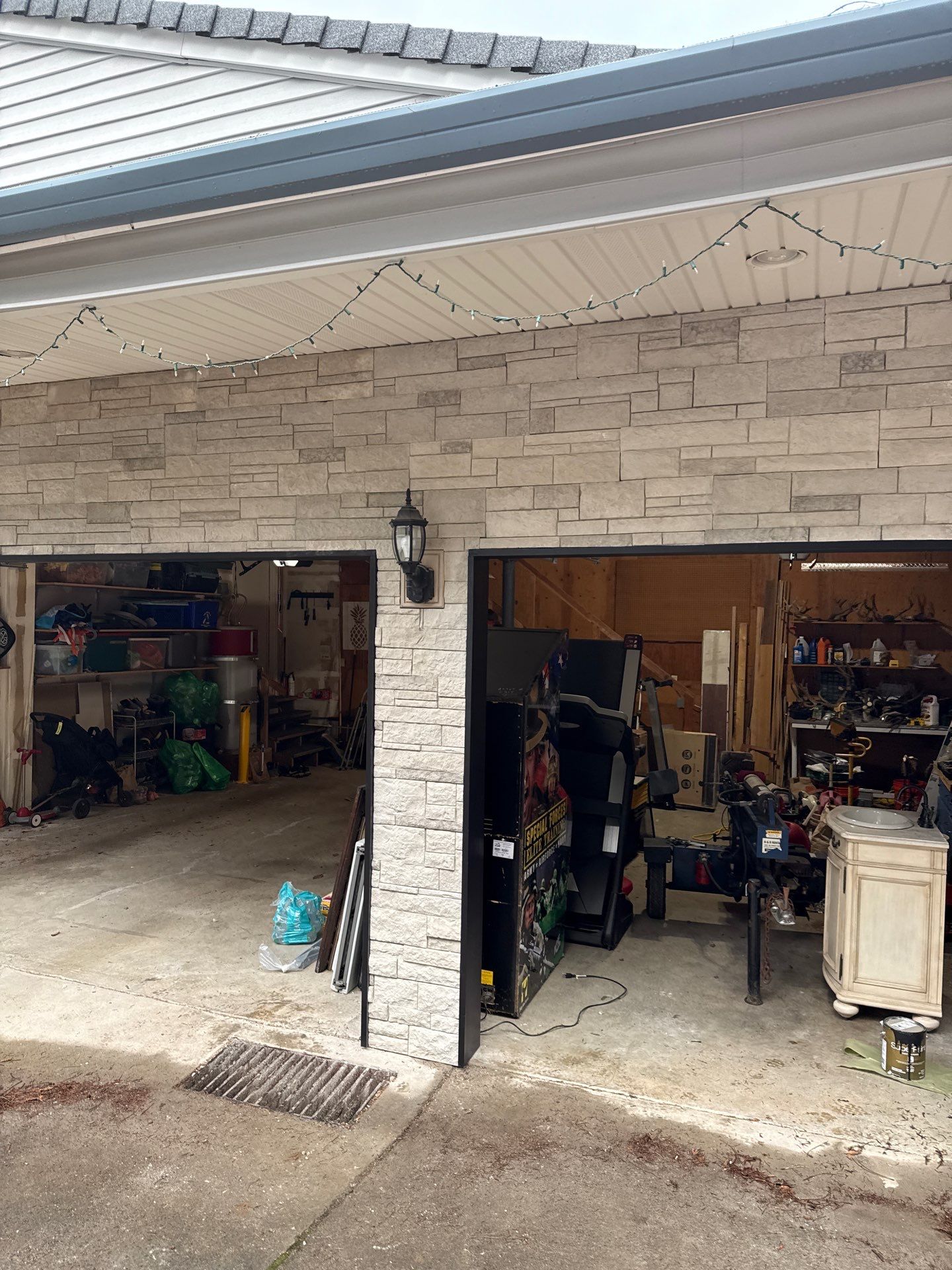 Damascus Garage Exterior Repair and Stacked Stone Veneer Installation by American Made Construction 