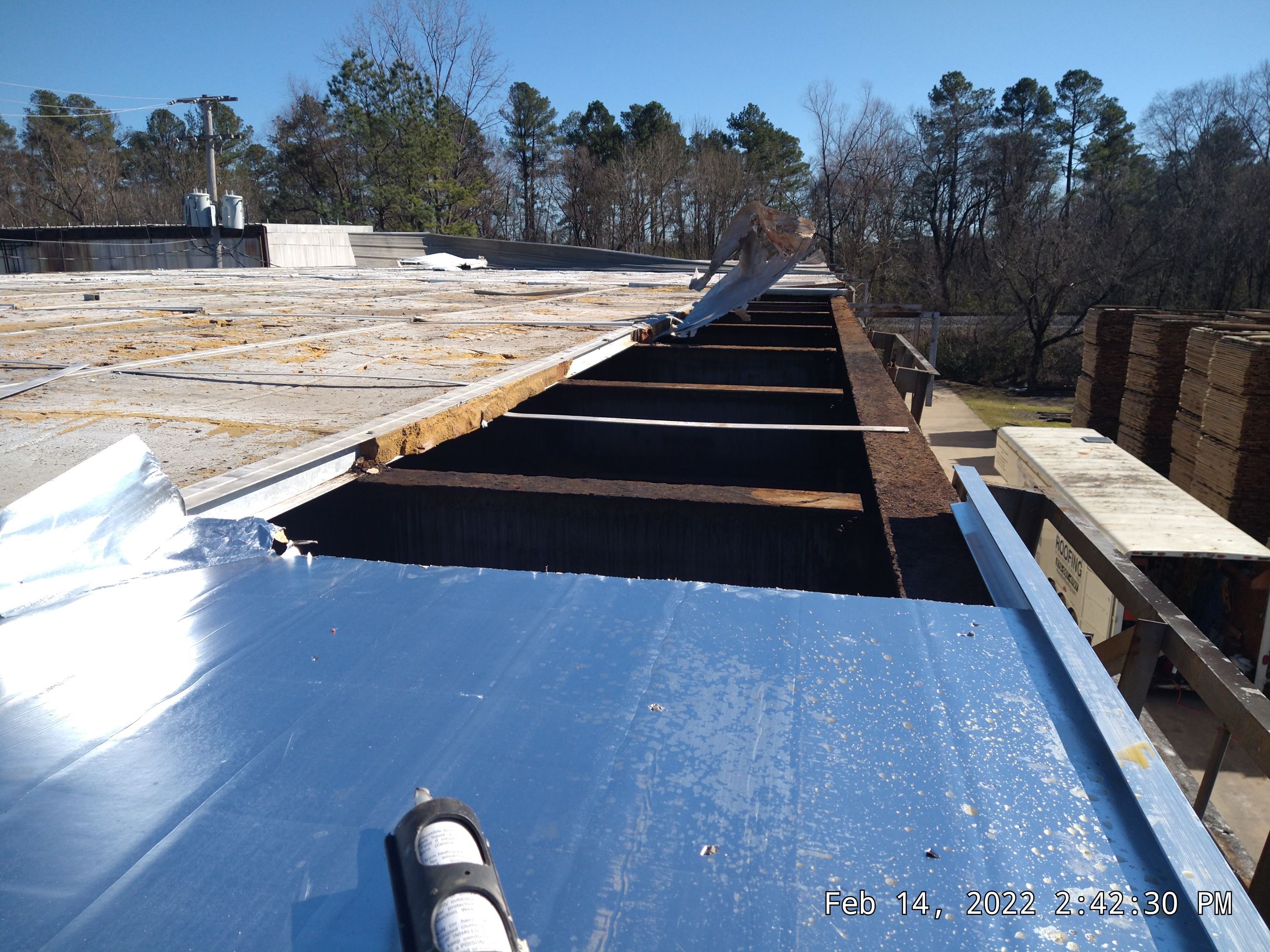 Commercial Roofing Installation using Aluminum Roofing panels by Hostetler Roofing