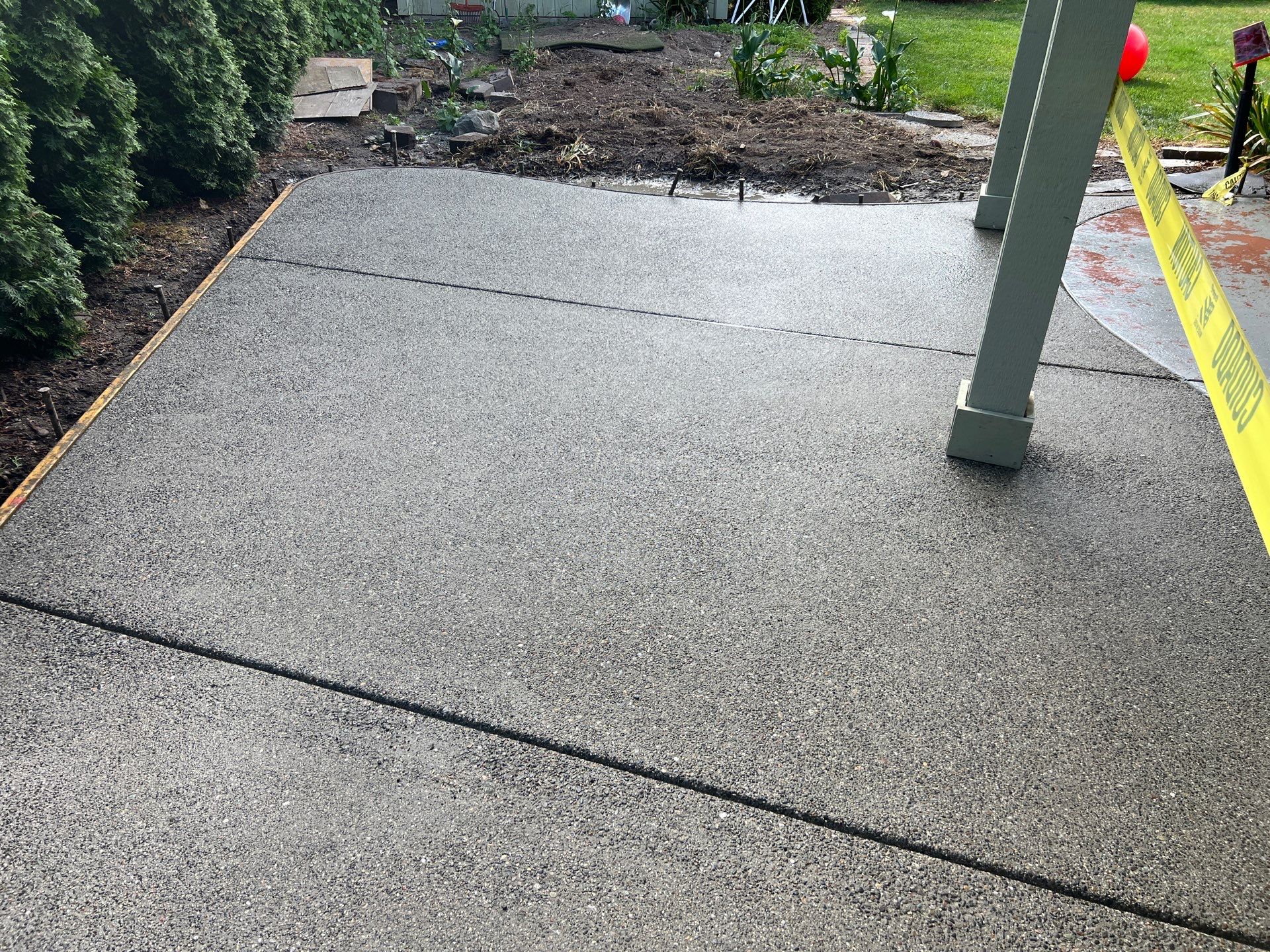 Ashley | Concrete Back Patio by Jireh Asphalt & Concrete Inc 