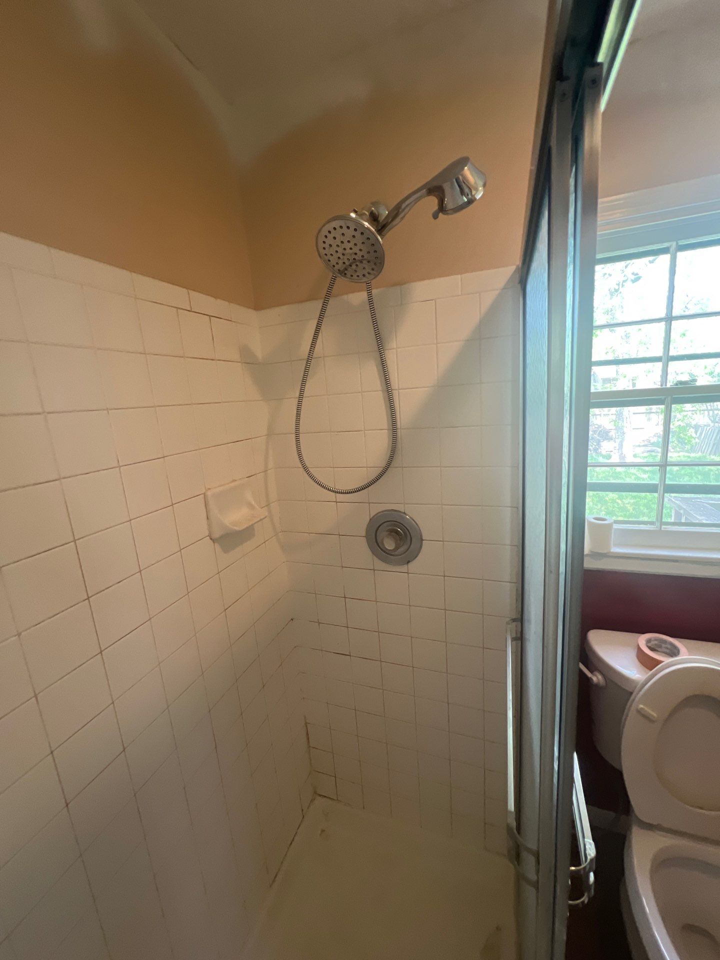 Bathroom Remodel using Tile Floor by The Shower Company
