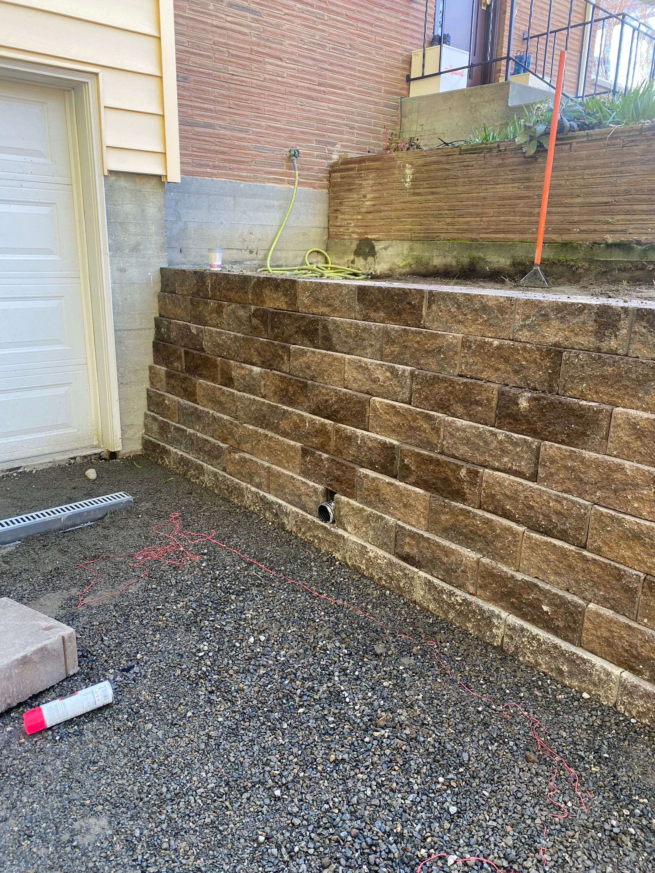 Lorra | Asphalt Driveway Repair & Retaining Wall by Jireh Asphalt & Concrete Inc 