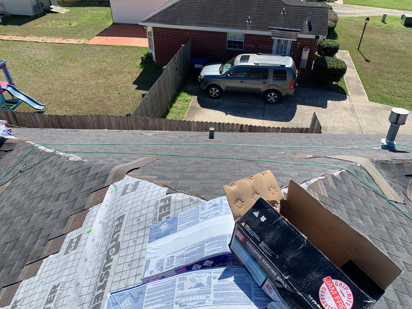 Residential Roofing Installation using Roof Replacement by American Roofing & Construction LLC